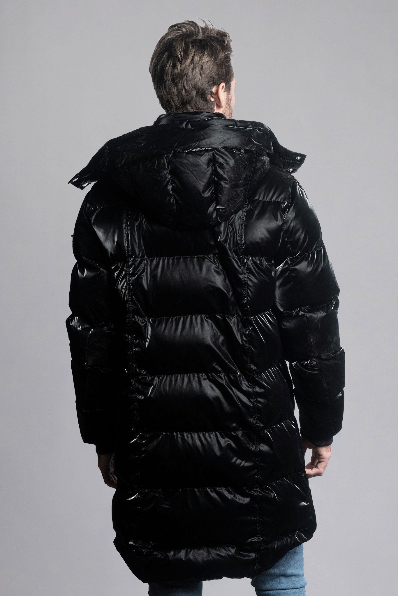 Woodpecker Men's Penguin Long Winter coat. High-end Canadian designer winter coat for men in shiny "All Wet Black" colour. Woodpecker cruelty-free winter coat designed in Canada. Men's heavy weight long length premium designer jacket for winter. Superior quality warm winter coat for men. Moose Knuckles, Canada Goose, Mackage, Montcler, Will Poho, Willbird, Nic Bayley