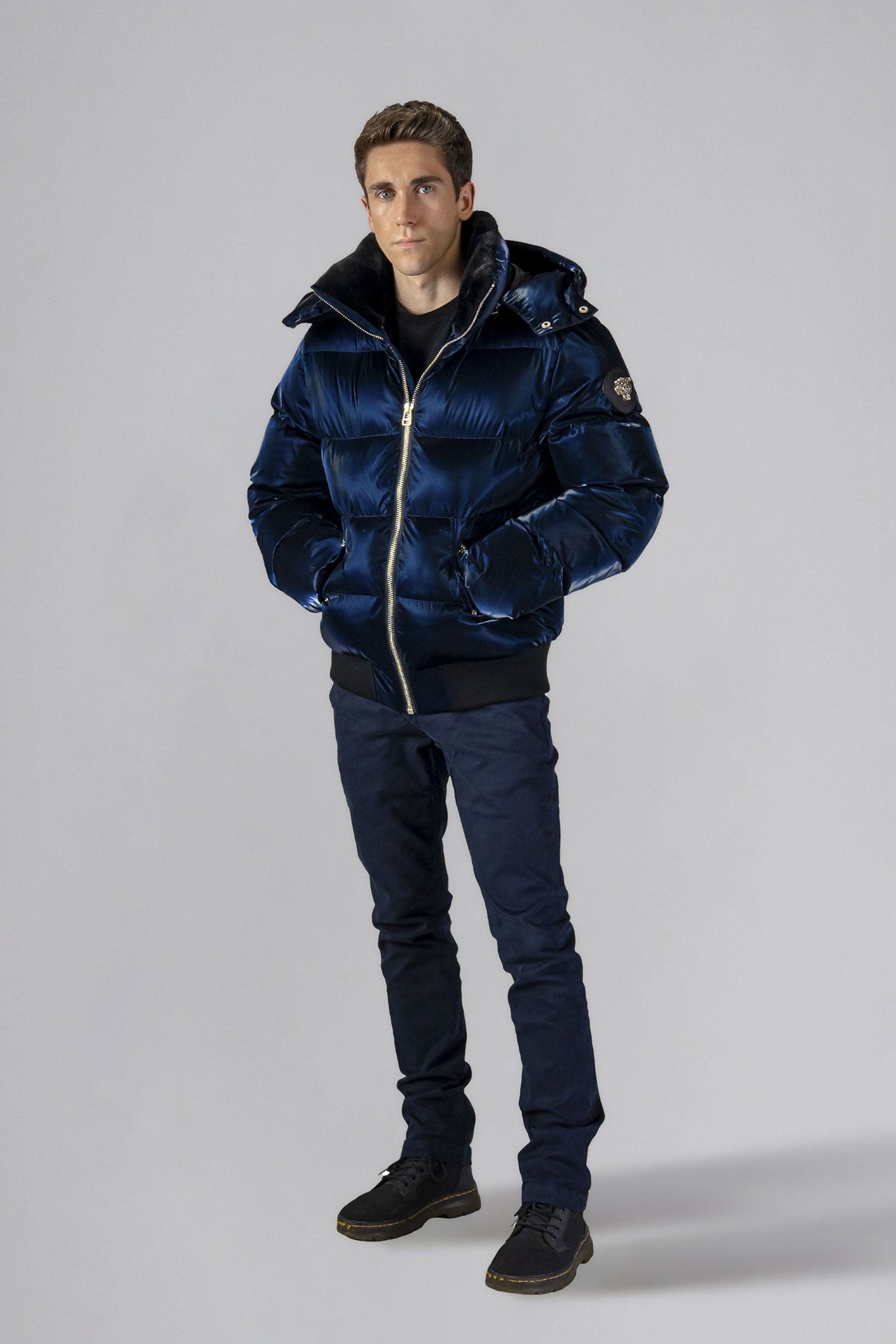 Woodpecker Men's Woody Bomber Winter coat. High-end Canadian designer winter coat for men in shiny “All Wet Navy" colour. Woodpecker cruelty-free winter coat designed in Canada. Men's heavy weight short length premium designer jacket for winter. Superior quality warm winter coat for men. Moose Knuckles, Canada Goose, Mackage, Montcler, Will Poho, Willbird, Nic Bayley. Shiny parka. Stylish winter jacket. Designer winter coat.