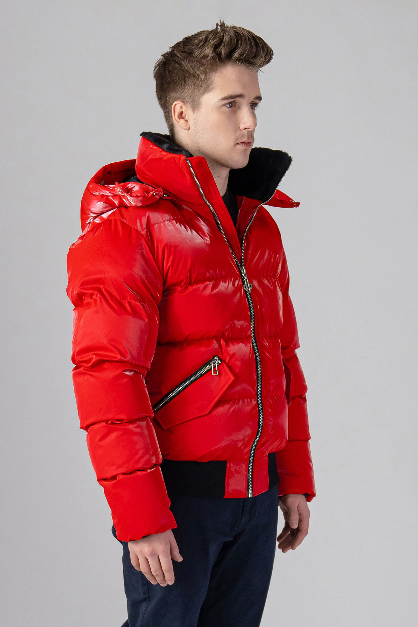 Woodpecker Men's Woody Bomber Winter coat. High-end Canadian designer winter coat for men in “Fashion Santa" colour. Woodpecker cruelty-free winter coat designed in Canada. Men's heavy weight short length premium designer jacket for winter. Superior quality warm winter coat for men. Moose Knuckles, Canada Goose, Mackage, Montcler, Will Poho, Willbird, Nic Bayley. Shiny parka. Stylish winter jacket. Designer winter coat.