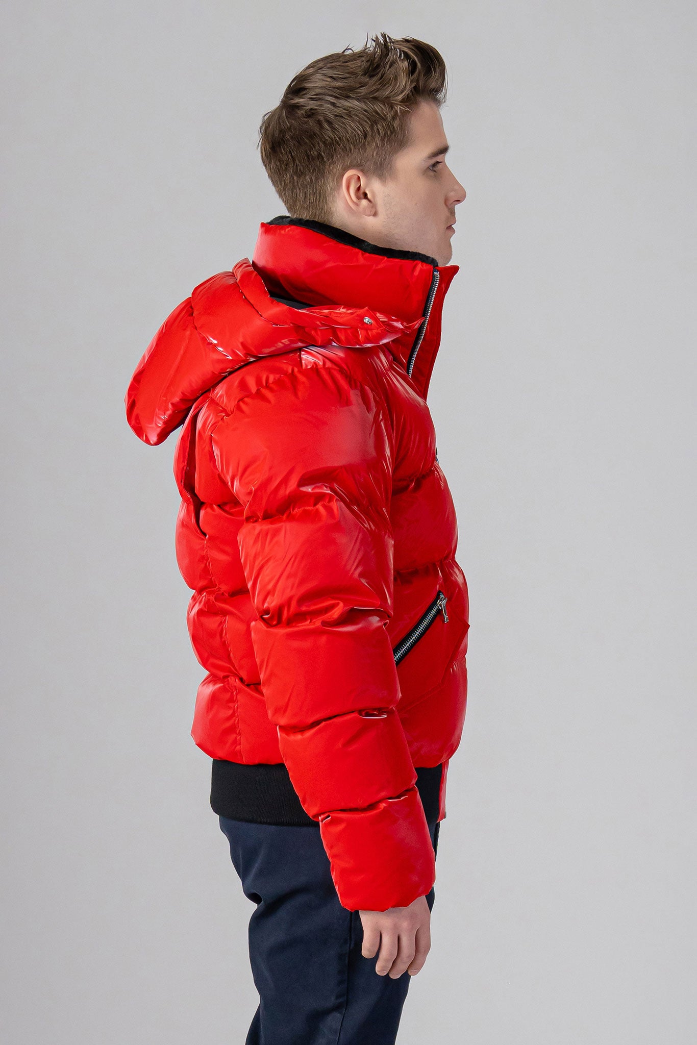 Woodpecker Men's Woody Bomber Winter coat. High-end Canadian designer winter coat for men in “Fashion Santa" colour. Woodpecker cruelty-free winter coat designed in Canada. Men's heavy weight short length premium designer jacket for winter. Superior quality warm winter coat for men. Moose Knuckles, Canada Goose, Mackage, Montcler, Will Poho, Willbird, Nic Bayley. Shiny parka. Stylish winter jacket. Designer winter coat.