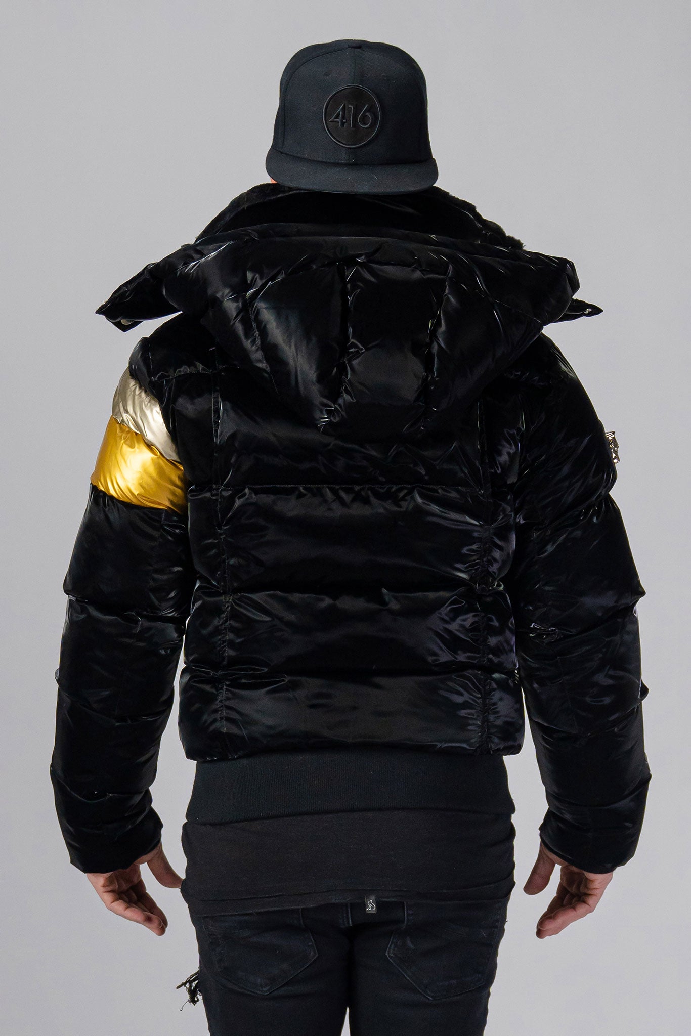 Woodpecker Men's Woody Bomber Winter coat. High-end Canadian designer winter coat for men in “Firebird" colour. Woodpecker cruelty-free winter coat designed in Canada. Men's heavy weight short length premium designer jacket for winter. Superior quality warm winter coat for men. Moose Knuckles, Canada Goose, Mackage, Montcler, Will Poho, Willbird, Nic Bayley. Shiny parka. Stylish winter jacket. Designer winter coat.