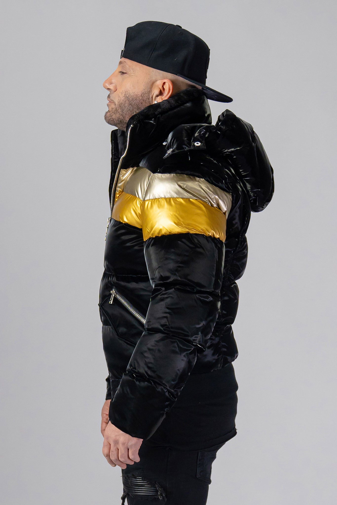 Woodpecker Men's Woody Bomber Winter coat. High-end Canadian designer winter coat for men in “Firebird" colour. Woodpecker cruelty-free winter coat designed in Canada. Men's heavy weight short length premium designer jacket for winter. Superior quality warm winter coat for men. Moose Knuckles, Canada Goose, Mackage, Montcler, Will Poho, Willbird, Nic Bayley. Shiny parka. Stylish winter jacket. Designer winter coat.