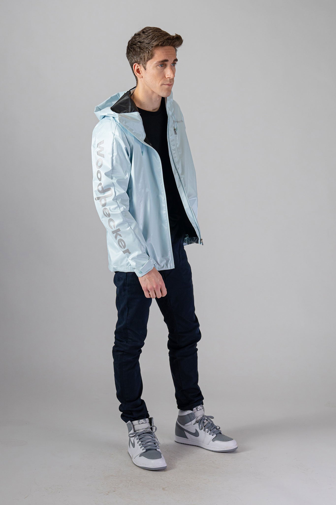 Woodpecker Men's Wind Shell coat. High-end Canadian designer activewear coat for men in "Pastel Blue" colour. Woodpecker coat designed in Canada. Moose Knuckles, Canada Goose, Mackage, Montcler, Will Poho, Willbird, Nic Bayley