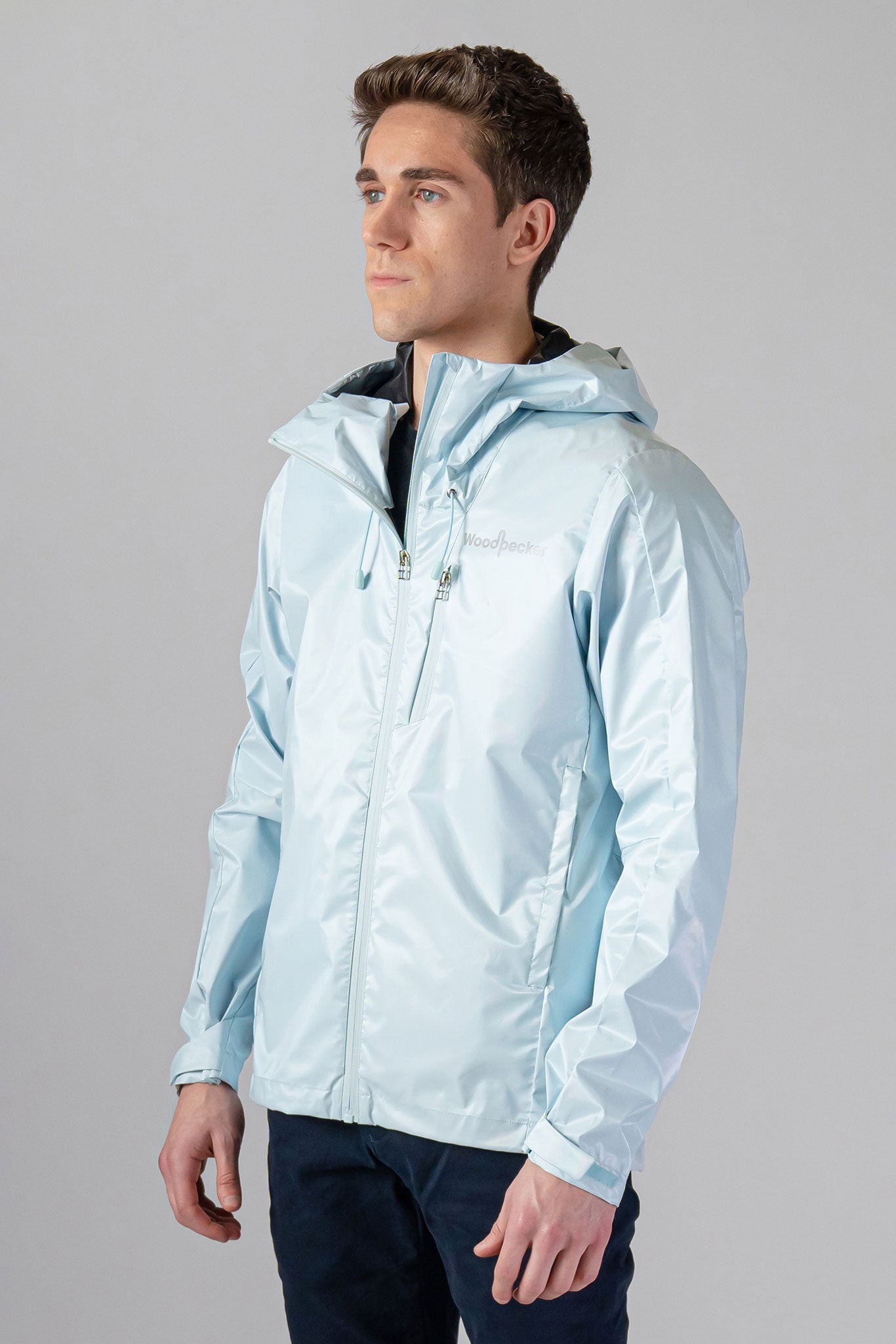 Woodpecker Men's Wind Shell coat. High-end Canadian designer activewear coat for men in "Pastel Blue" colour. Woodpecker coat designed in Canada. Moose Knuckles, Canada Goose, Mackage, Montcler, Will Poho, Willbird, Nic Bayley