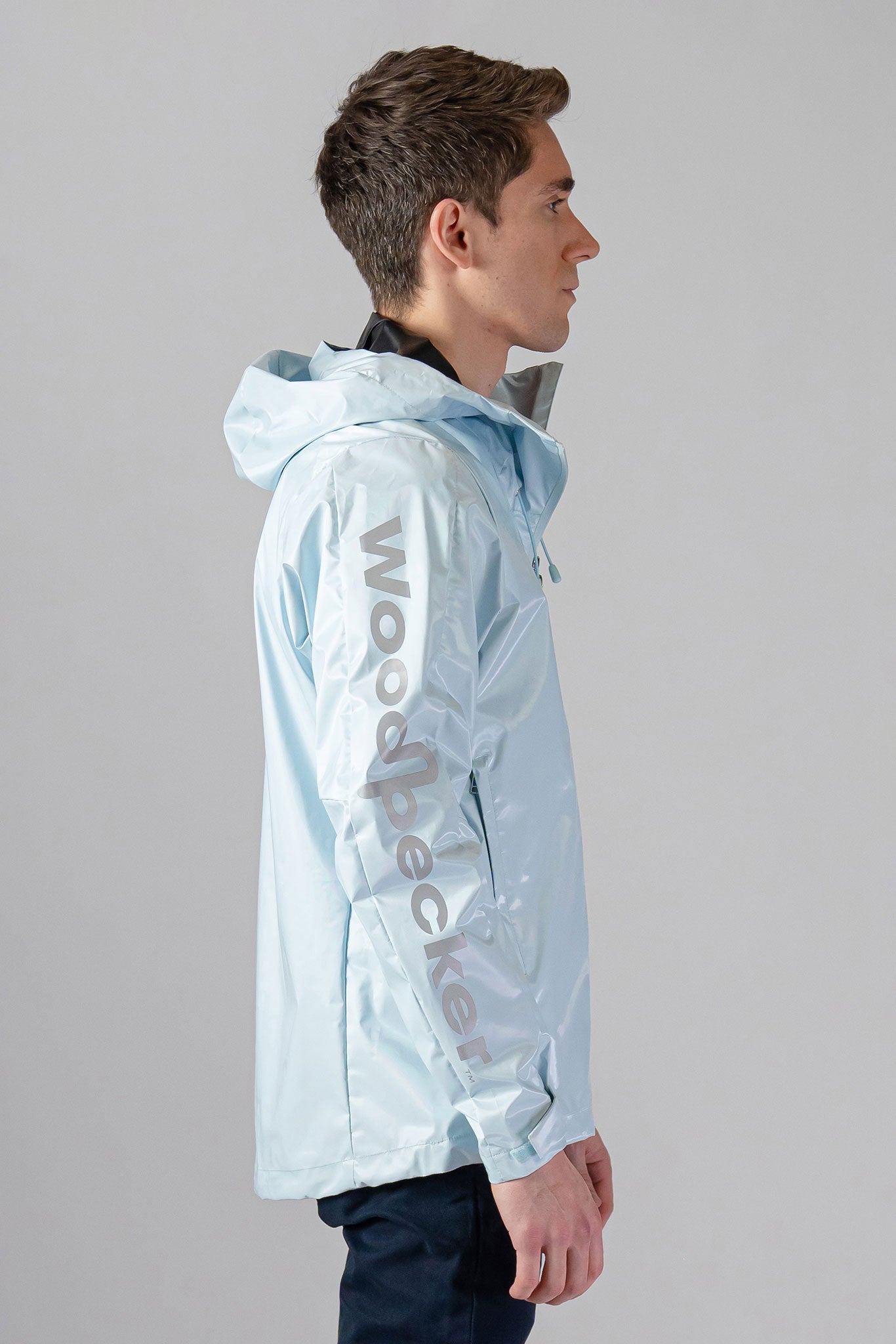 Woodpecker Men's Wind Shell coat. High-end Canadian designer activewear coat for men in "Pastel Blue" colour. Woodpecker coat designed in Canada. Moose Knuckles, Canada Goose, Mackage, Montcler, Will Poho, Willbird, Nic Bayley