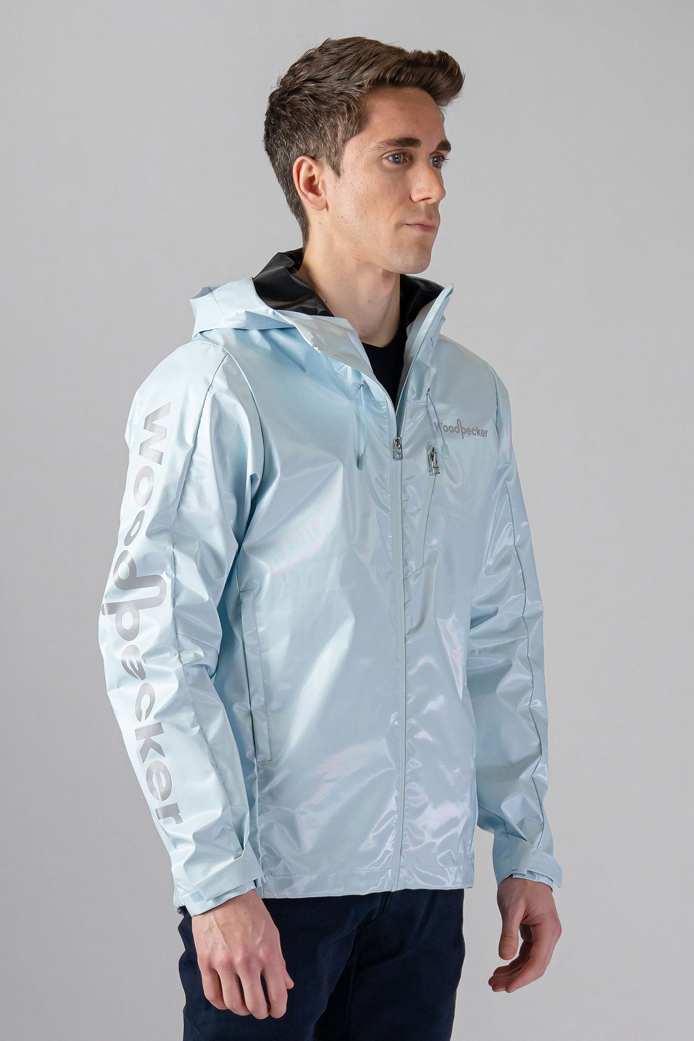Woodpecker Men's Wind Shell coat. High-end Canadian designer activewear coat for men in "Pastel Blue" colour. Woodpecker coat designed in Canada. Moose Knuckles, Canada Goose, Mackage, Montcler, Will Poho, Willbird, Nic Bayley