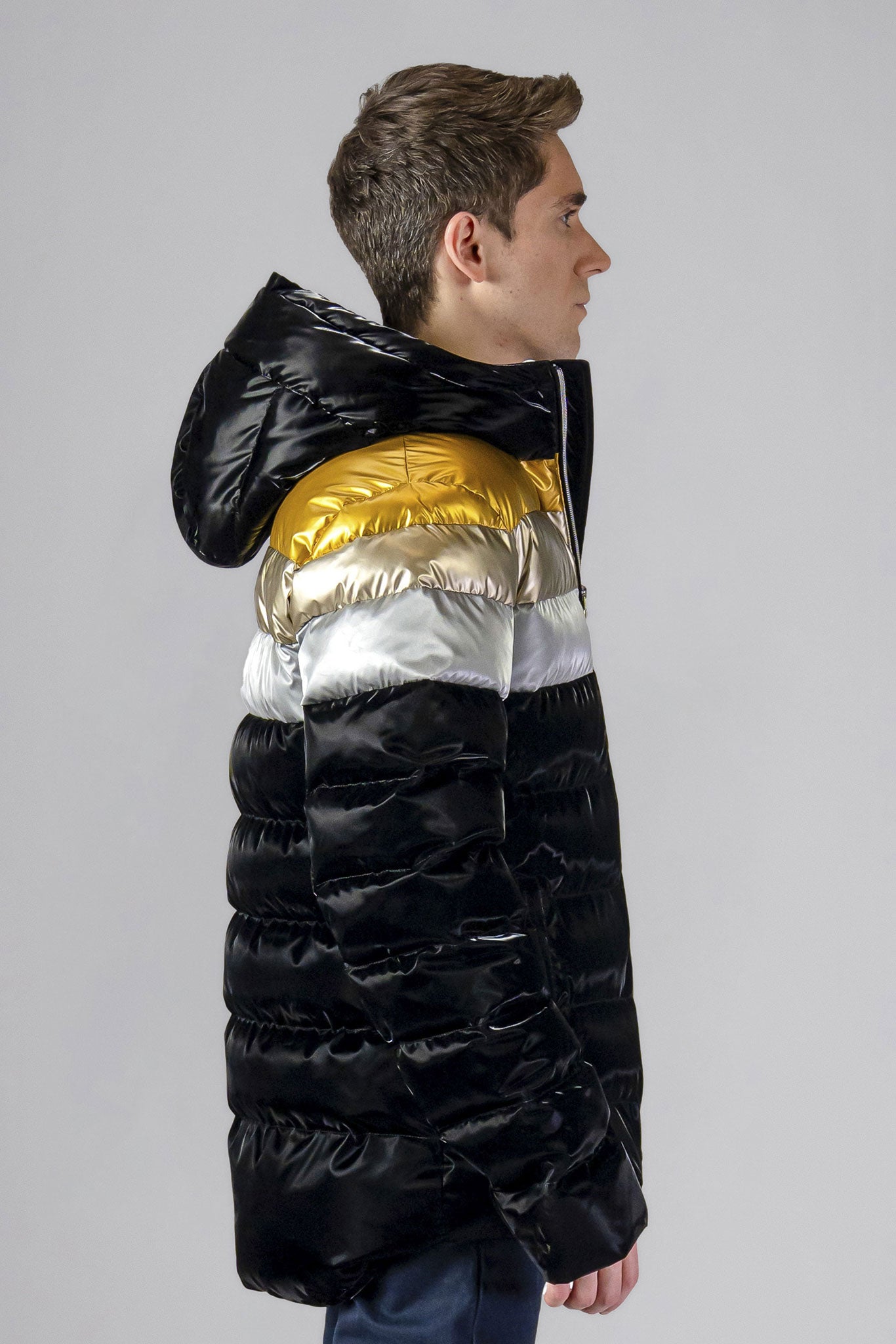 High-end Canadian designer winter coat for men in "Firebird" colour. Woodpecker cruelty-free winter coat designed in Canada. Men's medium weight medium length premium designer jacket for winter. Superior quality warm winter coat for men. Moose Knuckles, Canada Goose, Mackage, Montcler, Will Poho, Willbird, Nic Bayley. Shiny parka. Stylish winter jacket. Designer winter coat.