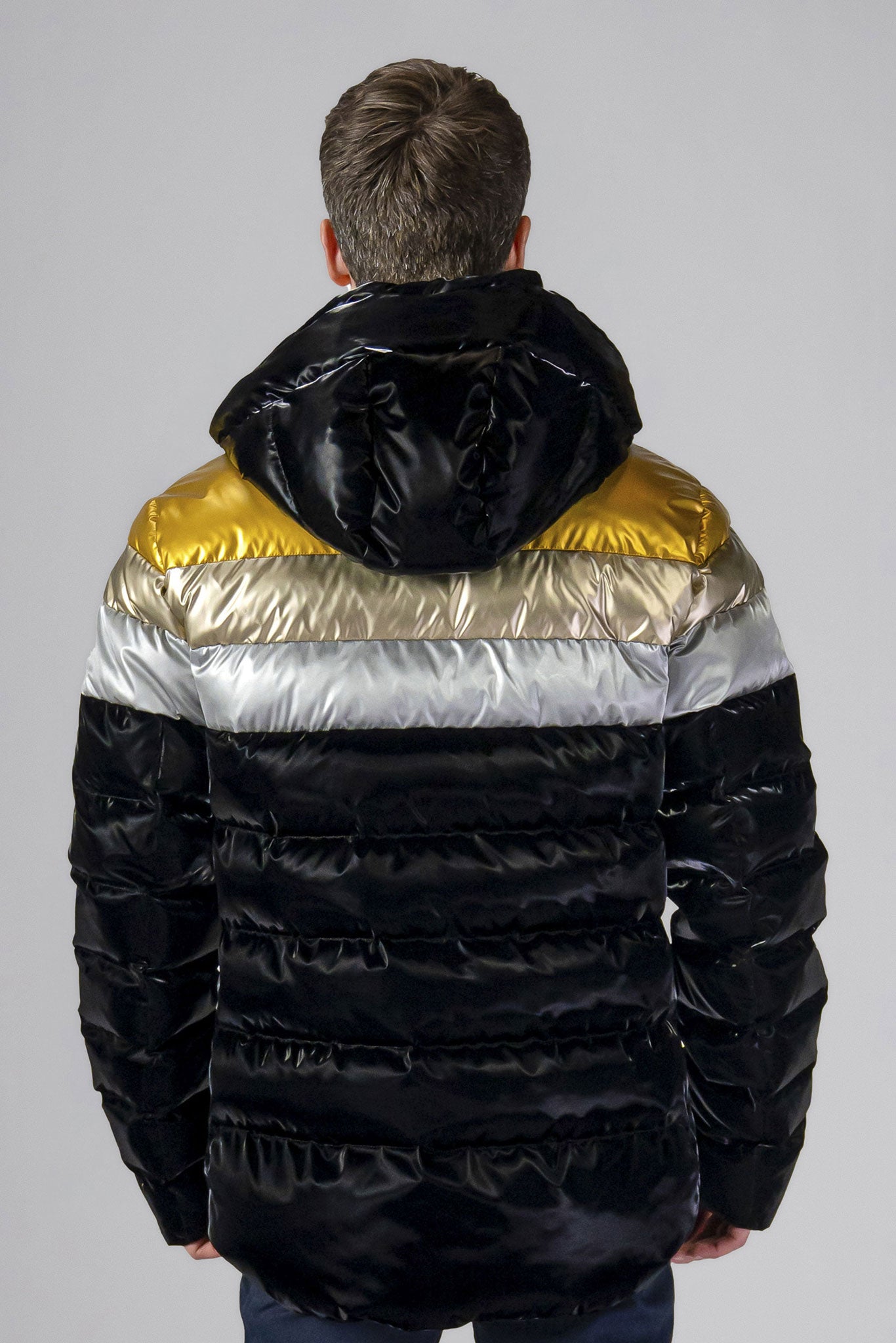 High-end Canadian designer winter coat for men in "Firebird" colour. Woodpecker cruelty-free winter coat designed in Canada. Men's medium weight medium length premium designer jacket for winter. Superior quality warm winter coat for men. Moose Knuckles, Canada Goose, Mackage, Montcler, Will Poho, Willbird, Nic Bayley. Shiny parka. Stylish winter jacket. Designer winter coat.