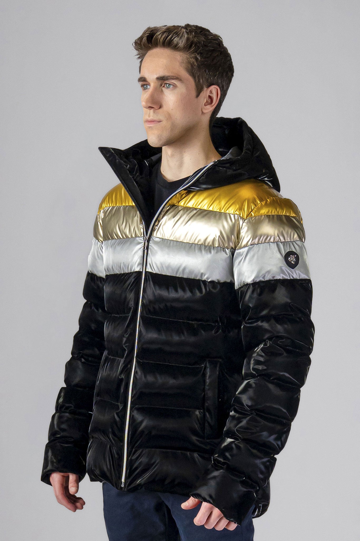 High-end Canadian designer winter coat for men in "Firebird" colour. Woodpecker cruelty-free winter coat designed in Canada. Men's medium weight medium length premium designer jacket for winter. Superior quality warm winter coat for men. Moose Knuckles, Canada Goose, Mackage, Montcler, Will Poho, Willbird, Nic Bayley. Shiny parka. Stylish winter jacket. Designer winter coat.