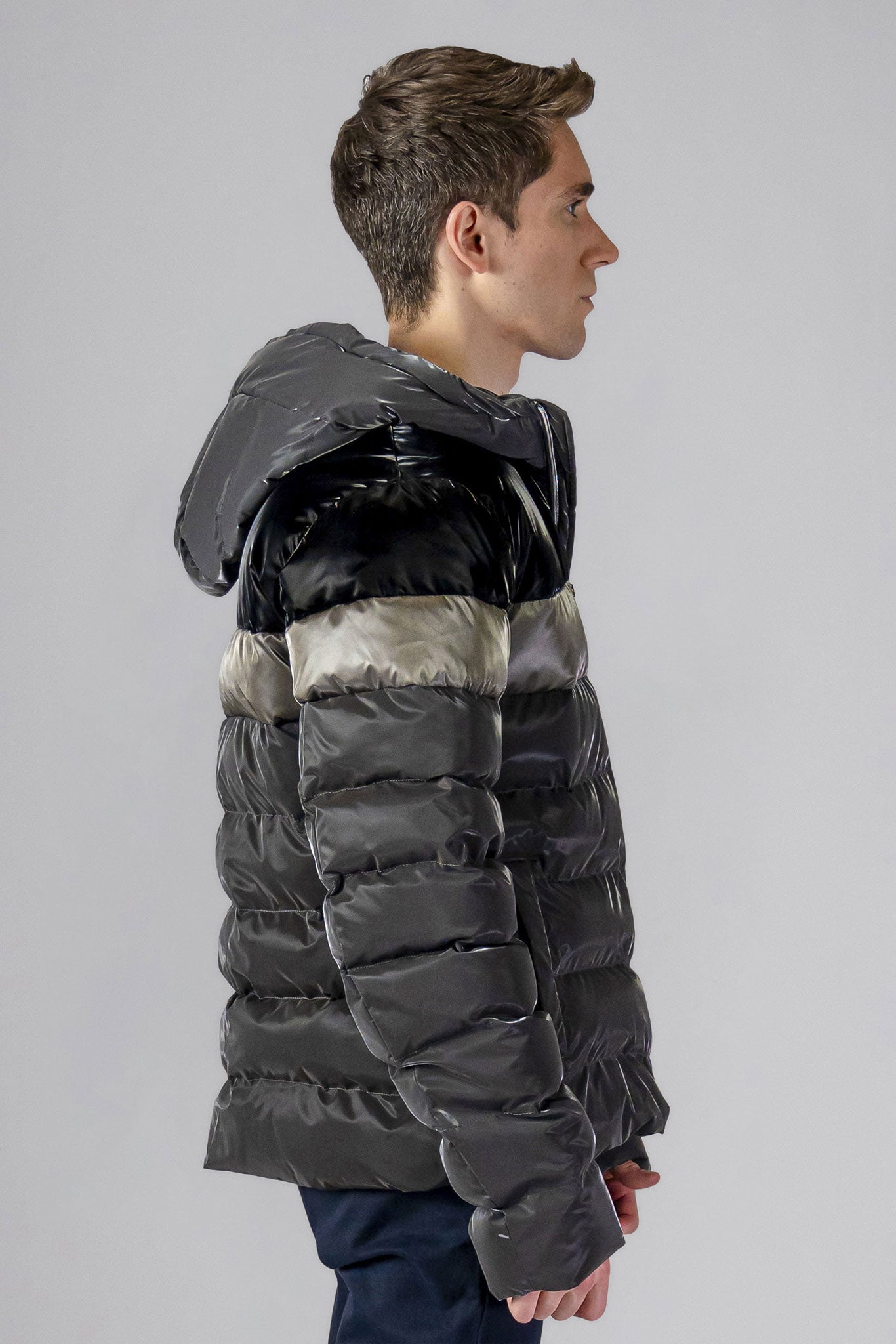 Woodpecker Men's Sparrow Winter coat. High-end Canadian designer winter coat for men in "Magnum" colour. Woodpecker cruelty-free winter coat designed in Canada. Men's medium weight medium length premium designer jacket for winter. Superior quality warm winter coat for men. Moose Knuckles, Canada Goose, Mackage, Montcler, Will Poho, Willbird, Nic Bayley. Shiny parka. Stylish winter jacket. Designer winter coat.