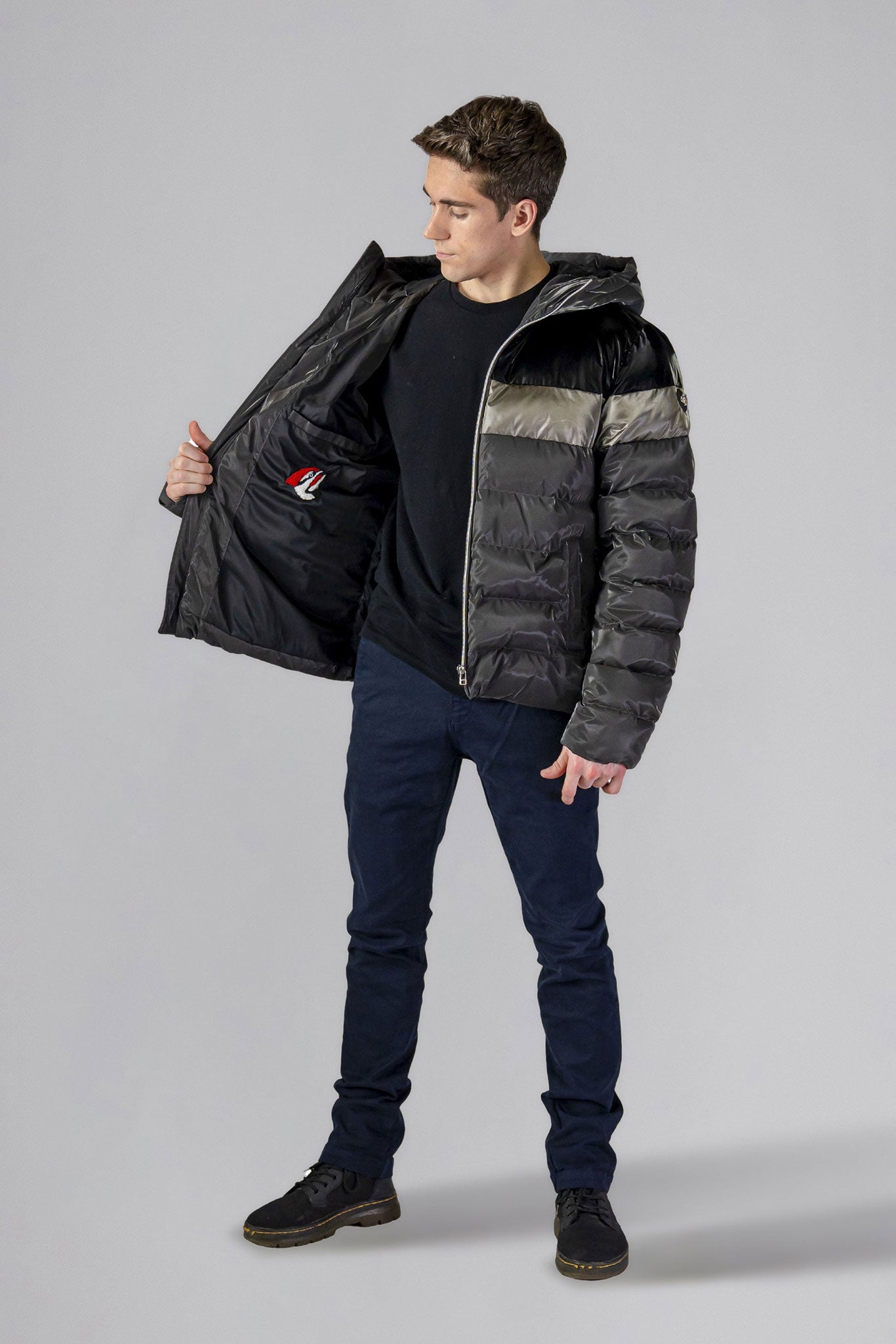 Woodpecker Men's Sparrow Winter coat. High-end Canadian designer winter coat for men in "Magnum" colour. Woodpecker cruelty-free winter coat designed in Canada. Men's medium weight medium length premium designer jacket for winter. Superior quality warm winter coat for men. Moose Knuckles, Canada Goose, Mackage, Montcler, Will Poho, Willbird, Nic Bayley. Shiny parka. Stylish winter jacket. Designer winter coat.