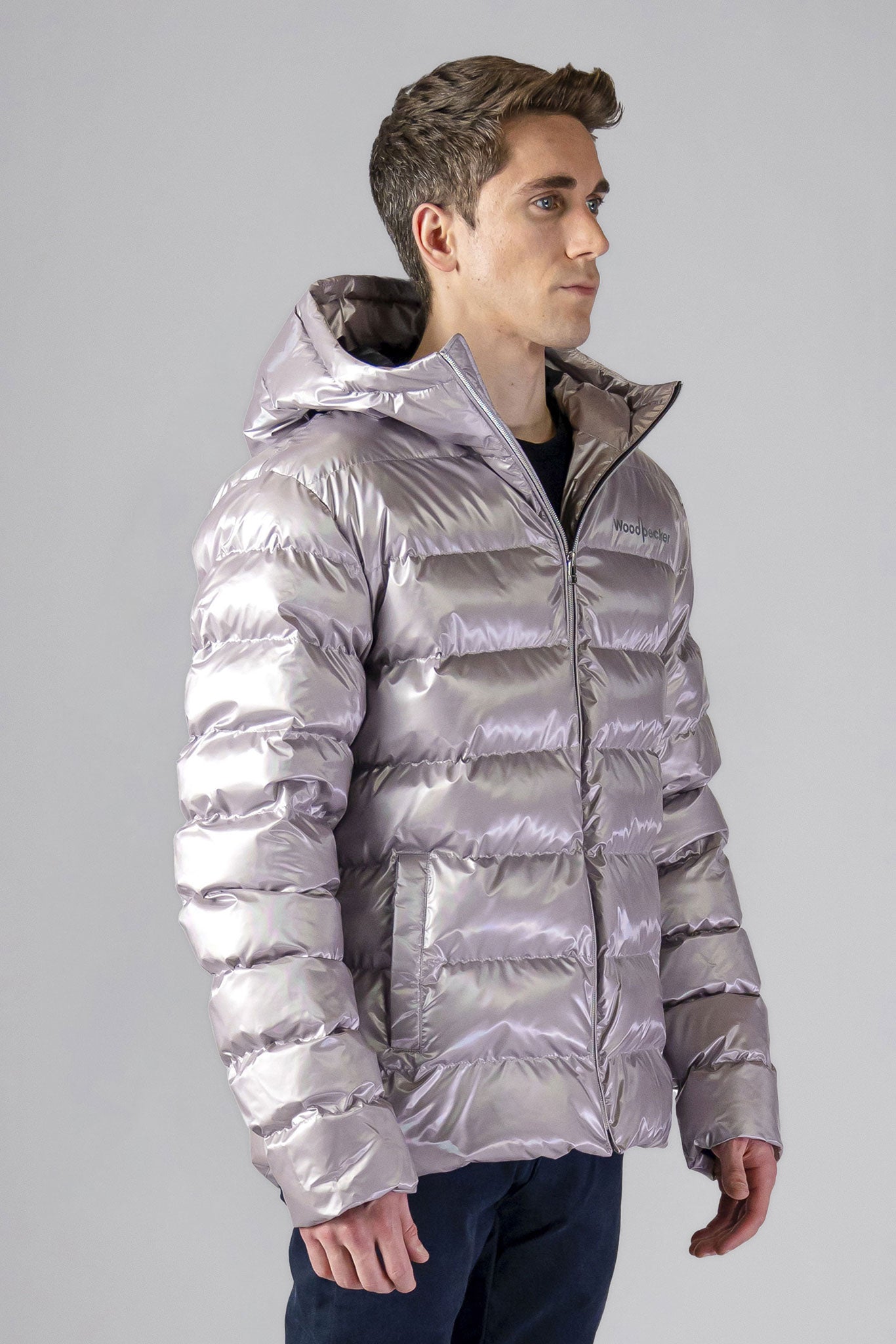 High-end Canadian designer winter coat for men in "Pearl Grey" colour. Woodpecker cruelty-free winter coat designed in Canada. Men's medium weight medium length premium designer jacket for winter. Superior quality warm winter coat for men. Moose Knuckles, Canada Goose, Mackage, Montcler, Will Poho, Willbird, Nic Bayley. Shiny parka. Stylish winter jacket. Designer winter coat.