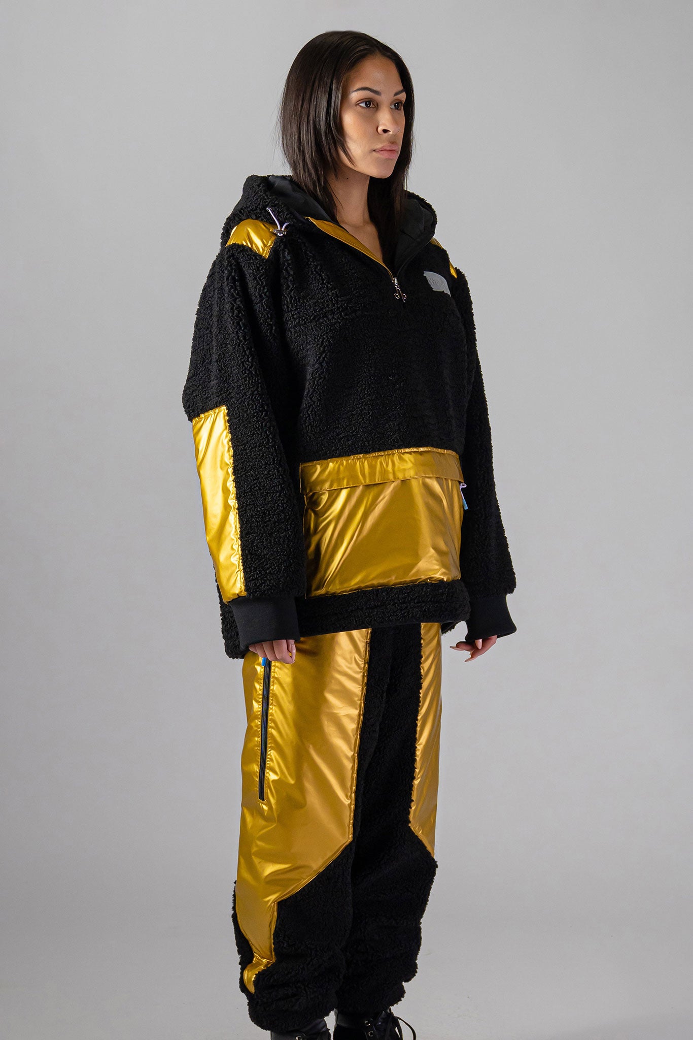 Woodpecker Unisex Fleece Hoodie. High-end Canadian designer winter fleece in "Gold" colour. Woodpecker fleece designed in Canada. Warm premium designer fleece for winter. Superior quality warm fleece hoodie. Moose Knuckles, Canada Goose, Mackage, Montcler, Will Poho, Willbird, Nic Bayley. Cozy for at-home wear.