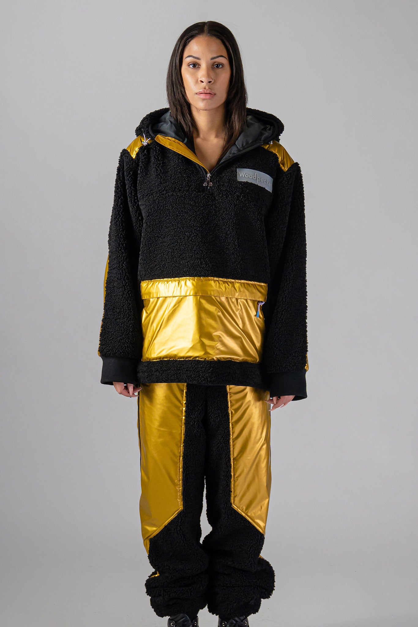 Woodpecker Unisex Fleece Hoodie. High-end Canadian designer winter fleece in "Gold" colour. Woodpecker fleece designed in Canada. Warm premium designer fleece for winter. Superior quality warm fleece hoodie. Moose Knuckles, Canada Goose, Mackage, Montcler, Will Poho, Willbird, Nic Bayley. Cozy for at-home wear.