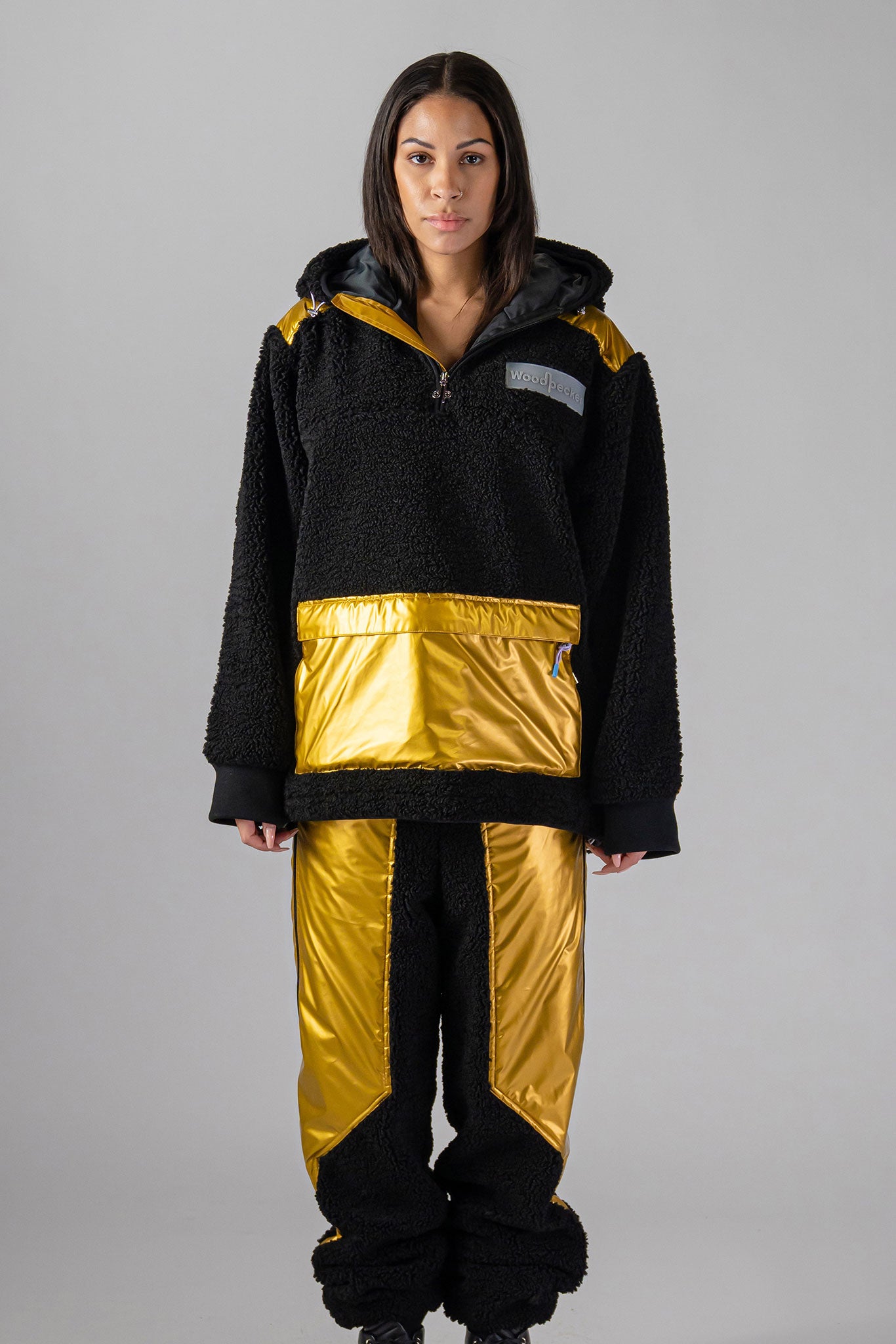 Woodpecker Unisex Fleece Hoodie. High-end Canadian designer winter fleece in "Gold" colour. Woodpecker fleece designed in Canada. Warm premium designer fleece for winter. Superior quality warm fleece hoodie. Moose Knuckles, Canada Goose, Mackage, Montcler, Will Poho, Willbird, Nic Bayley. Cozy for at-home wear.