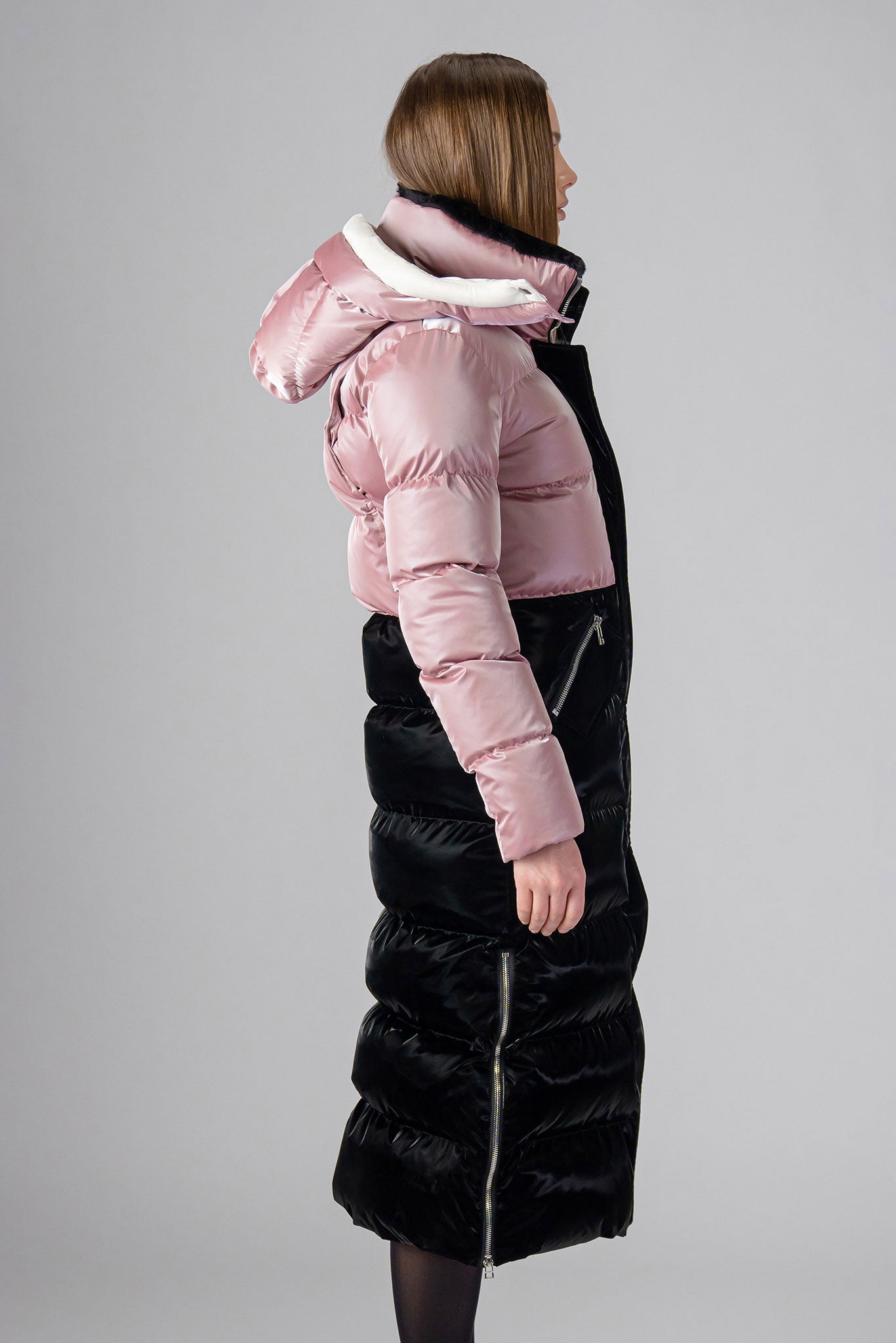 Woodpecker Women's Extra Long Bird of Paradise Winter coat. High-end Canadian designer winter coat for women in “Arctic Rose and Black" colour. Woodpecker cruelty-free winter coat designed in Canada. Women's heavy weight extra long length premium designer jacket for winter. Superior quality warm winter coat for women. Moose Knuckles, Canada Goose, Mackage, Montcler, Will Poho, Willbird, Nic Bayley. Extra warm. Shiny parka. Stylish winter jacket. Designer winter coat.