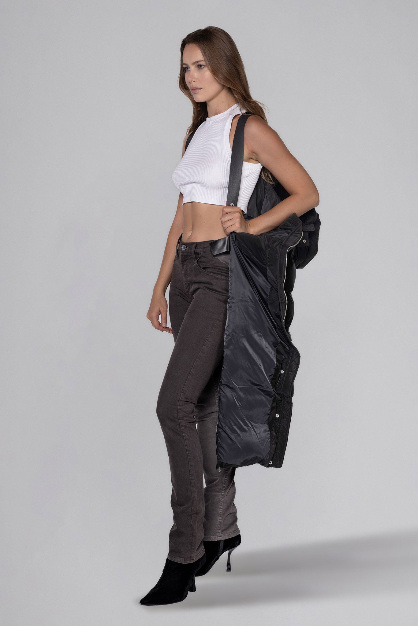 Woodpecker Women's Extra Long Bird of Paradise Winter coat. High-end Canadian designer winter coat for women in “Black Diamond" colour. Woodpecker cruelty-free winter coat designed in Canada. Women's heavy weight extra long length premium designer jacket for winter. Superior quality warm winter coat for women. Moose Knuckles, Canada Goose, Mackage, Montcler, Will Poho, Willbird, Nic Bayley. Extra warm. Shiny parka. Stylish winter jacket. Designer winter coat.