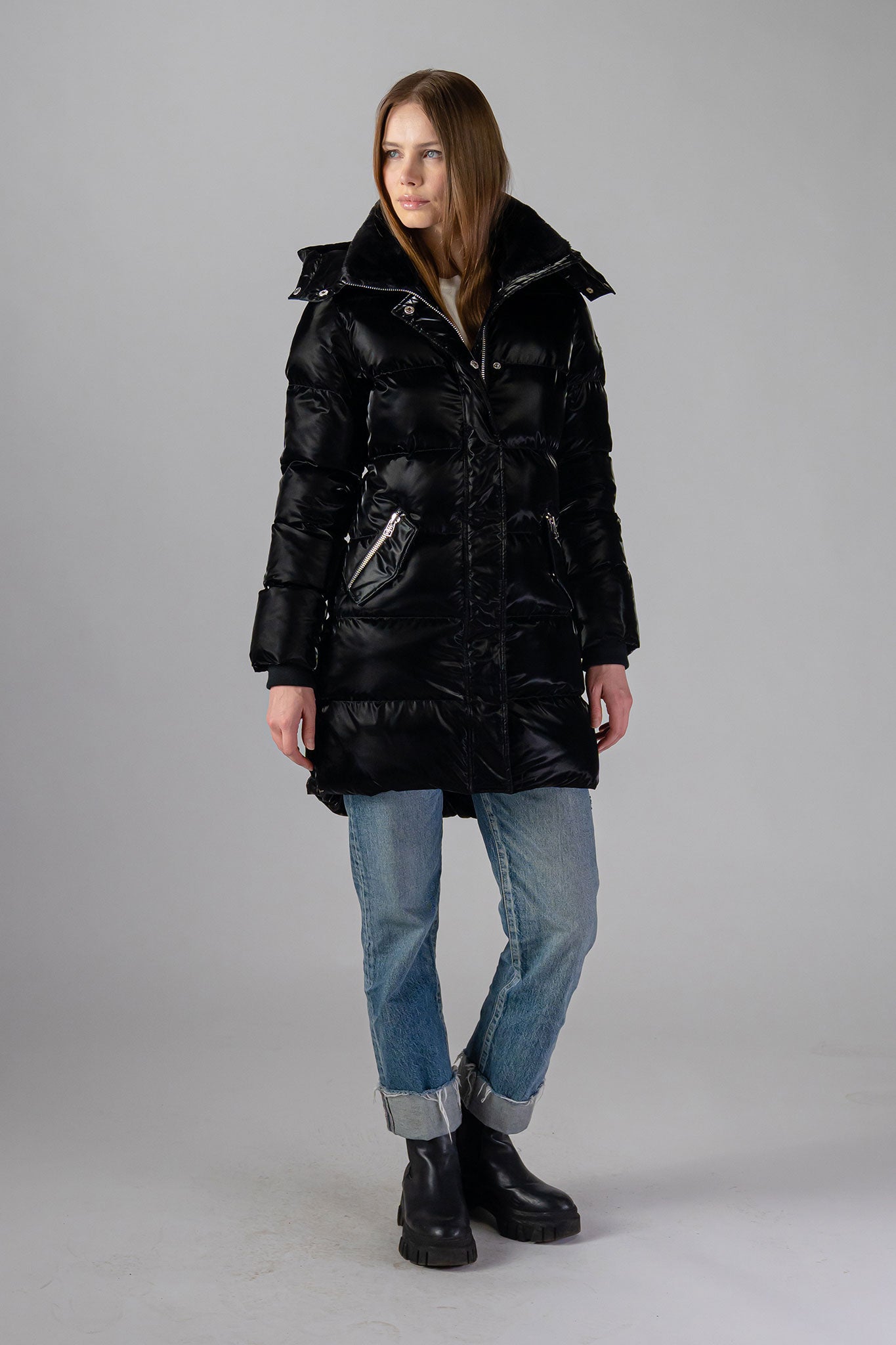 Woodpecker Women's Penguin Long Winter coat. High-end Canadian designer winter coat for women in "All Wet Black" colour. Woodpecker cruelty-free winter coat designed in Canada. Women's heavy weight long length premium designer jacket for winter. Superior quality warm winter coat for women. Moose Knuckles, Canada Goose, Mackage, Montcler, Will Poho, Willbird, Nic Bayley. Extra warm. Shiny parka. Stylish winter jacket. Designer winter coat.