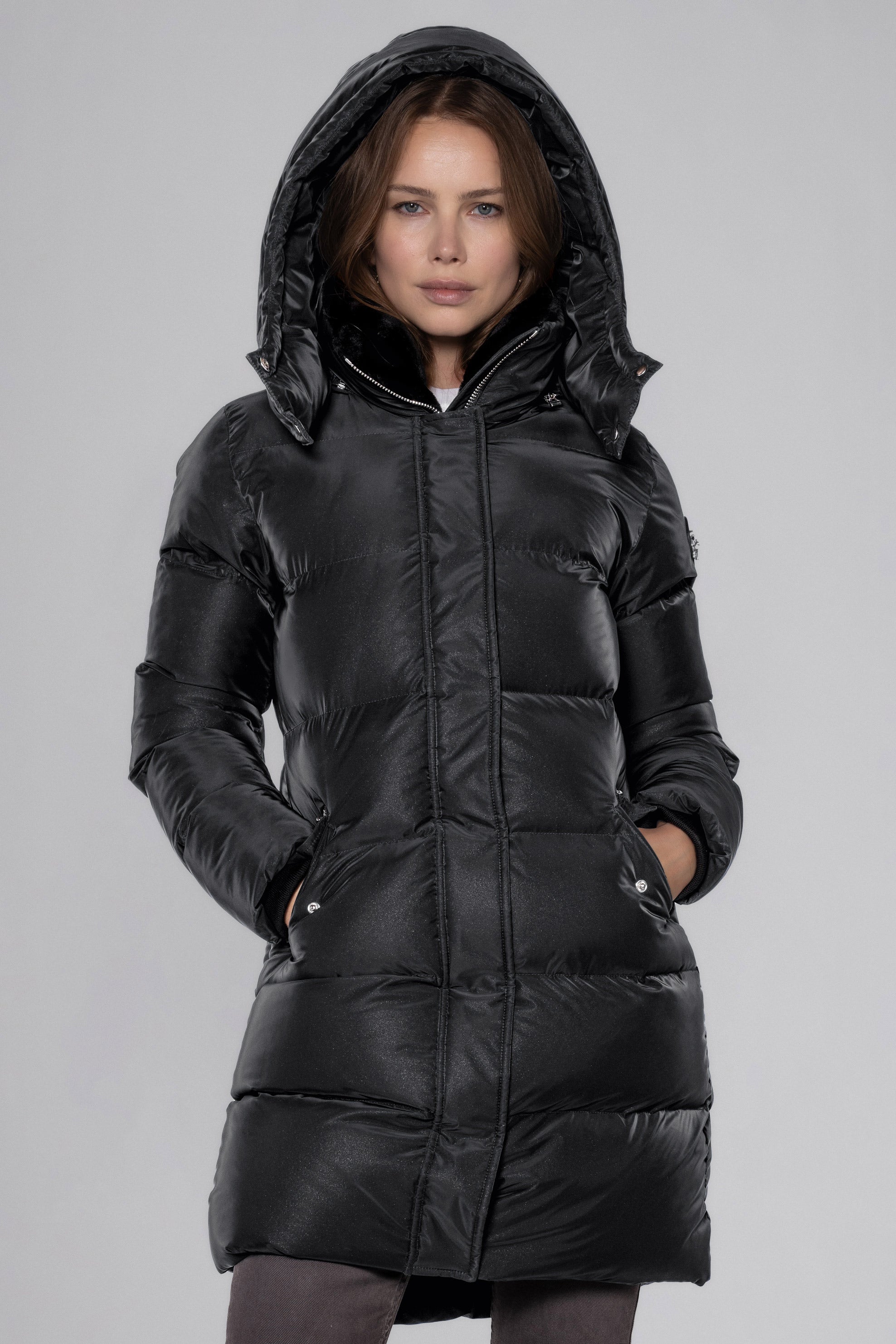 Woodpecker Women's Penguin Long Winter coat. High-end Canadian designer winter coat for women in "Black Diamond" colour. Woodpecker cruelty-free winter coat designed in Canada. Women's heavy weight long length premium designer jacket for winter. Superior quality warm winter coat for women. Moose Knuckles, Canada Goose, Mackage, Montcler, Will Poho, Willbird, Nic Bayley