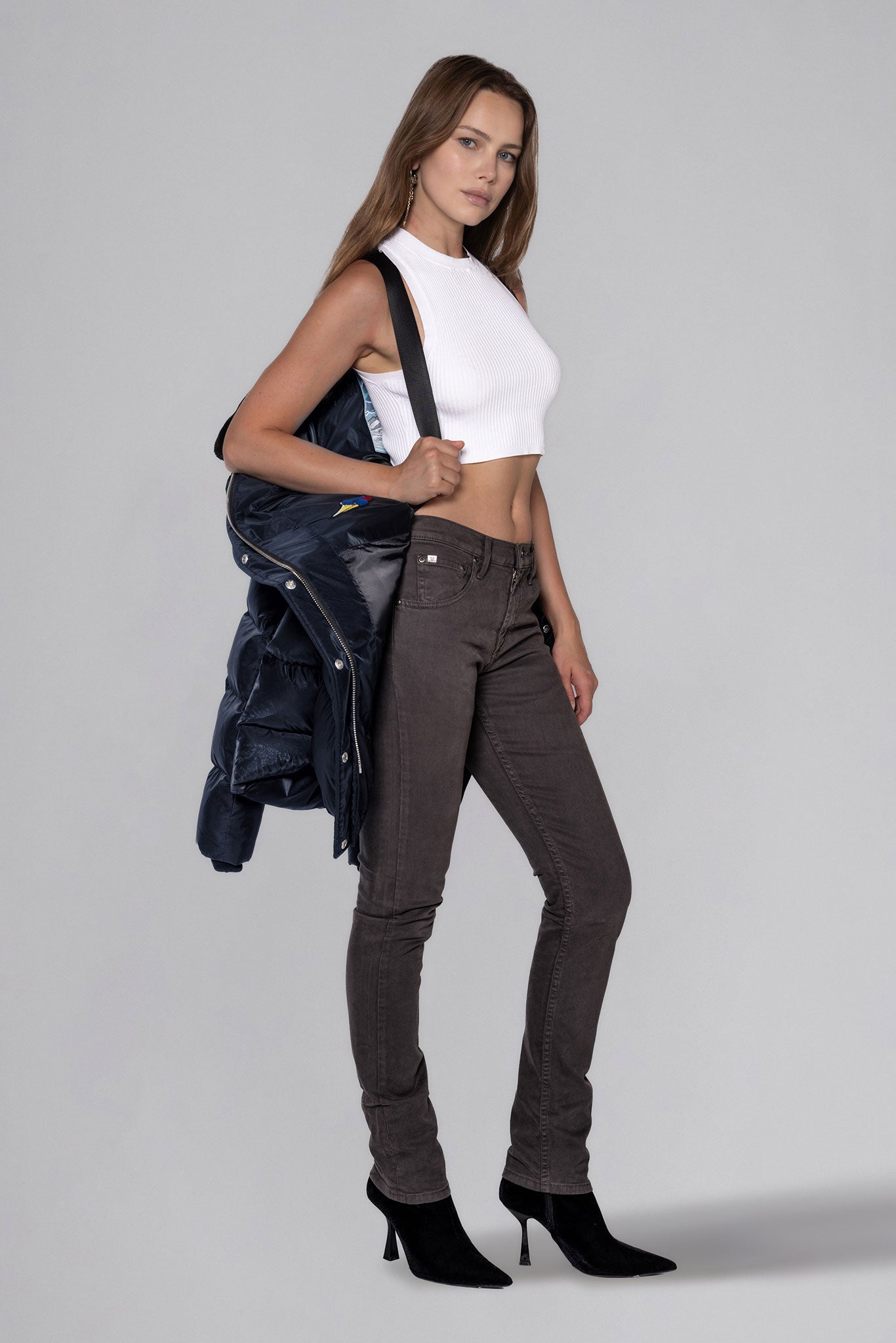 Woodpecker Women's Penguin Long Winter coat. High-end Canadian designer winter coat for women in "Blue Diamond" colour. Woodpecker cruelty-free winter coat designed in Canada. Women's heavy weight long length premium designer jacket for winter. Superior quality warm winter coat for women. Moose Knuckles, Canada Goose, Mackage, Montcler, Will Poho, Willbird, Nic Bayley. Extra warm. Shiny parka. Stylish winter jacket. Designer winter coat.