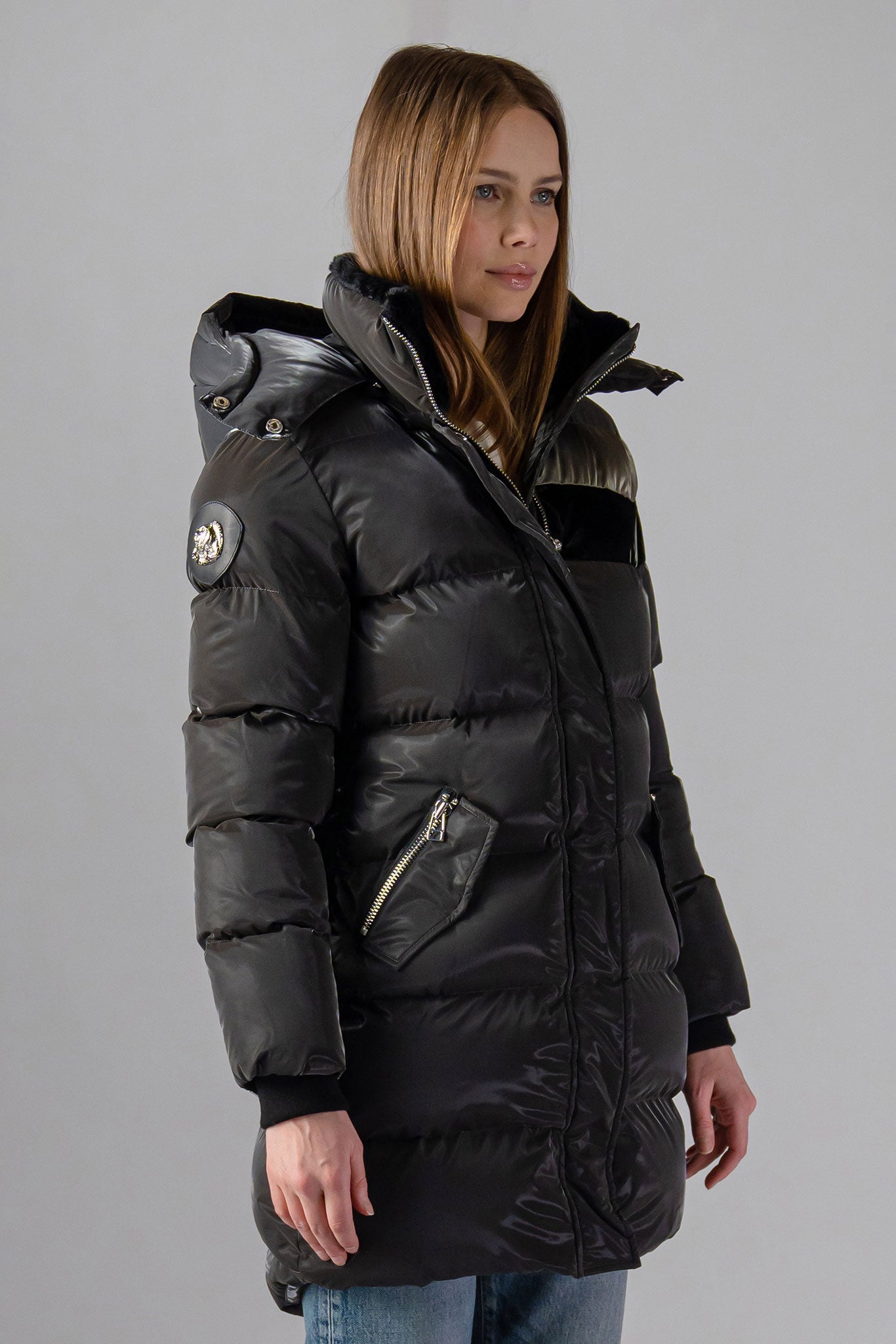 Woodpecker Women's Penguin Long Winter coat. High-end Canadian designer winter coat for women in "Magnum" Grey colour. Woodpecker cruelty-free winter coat designed in Canada. Women's heavy weight long length premium designer jacket for winter. Superior quality warm winter coat for women. Moose Knuckles, Canada Goose, Mackage, Montcler, Will Poho, Willbird, Nic Bayley. Extra warm. Shiny parka. Stylish winter jacket. Designer winter coat.