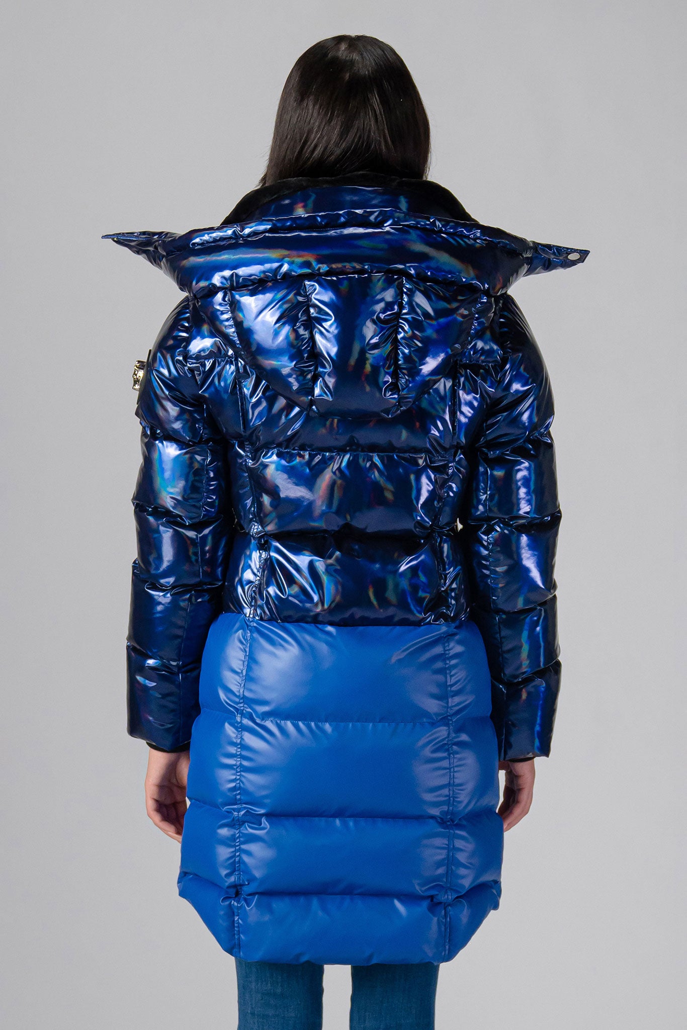 Woodpecker Women's Penguin Long Winter coat. High-end Canadian designer winter coat for women in "Oily Blue Blue" colour. Woodpecker cruelty-free winter coat designed in Canada. Women's heavy weight long length premium designer jacket for winter. Superior quality warm winter coat for women. Moose Knuckles, Canada Goose, Mackage, Montcler, Will Poho, Willbird, Nic Bayley. Extra warm. Shiny parka. Stylish winter jacket. Designer winter coat.