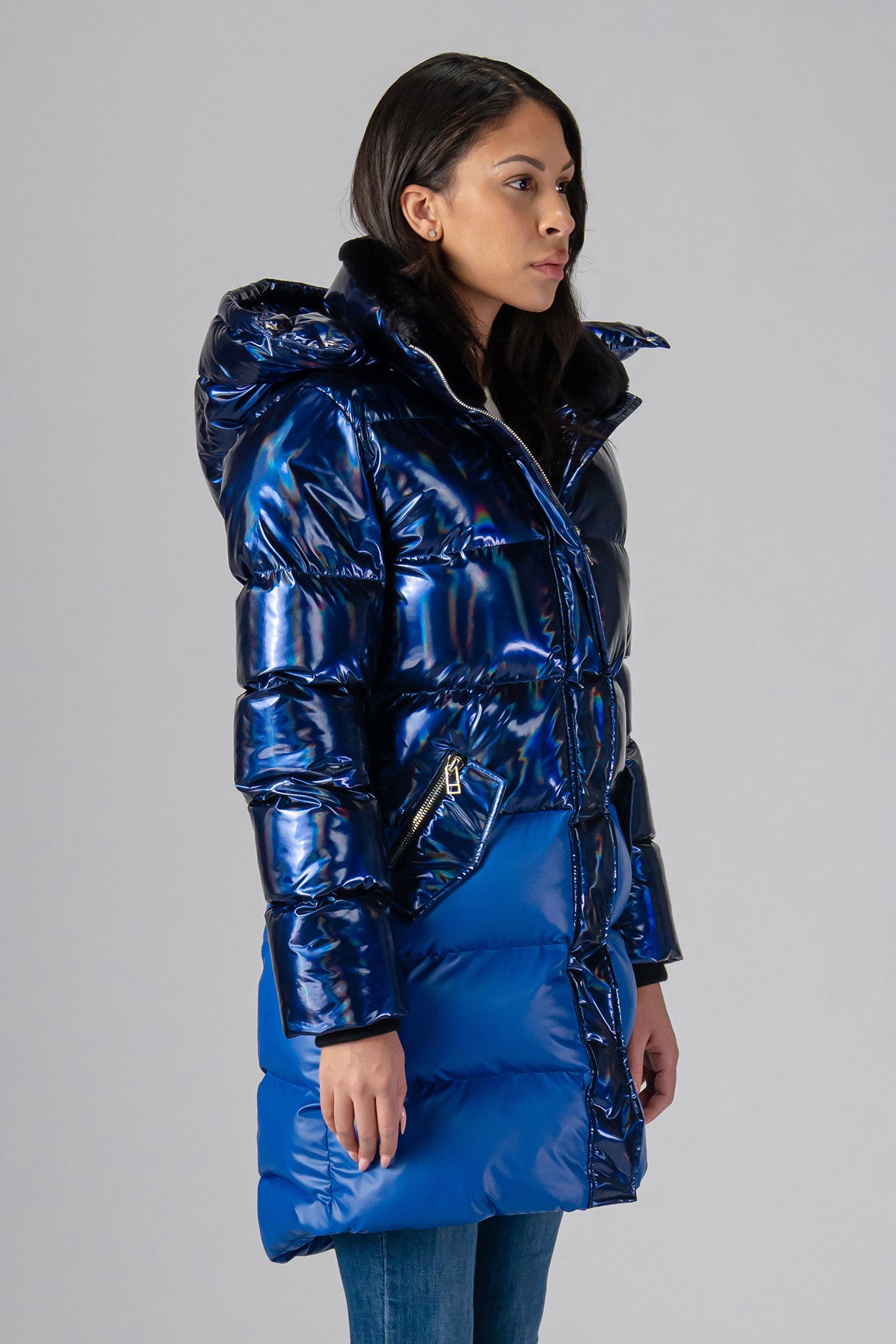 Woodpecker Women's Penguin Long Winter coat. High-end Canadian designer winter coat for women in "Oily Blue Blue" colour. Woodpecker cruelty-free winter coat designed in Canada. Women's heavy weight long length premium designer jacket for winter. Superior quality warm winter coat for women. Moose Knuckles, Canada Goose, Mackage, Montcler, Will Poho, Willbird, Nic Bayley. Extra warm. Shiny parka. Stylish winter jacket. Designer winter coat.