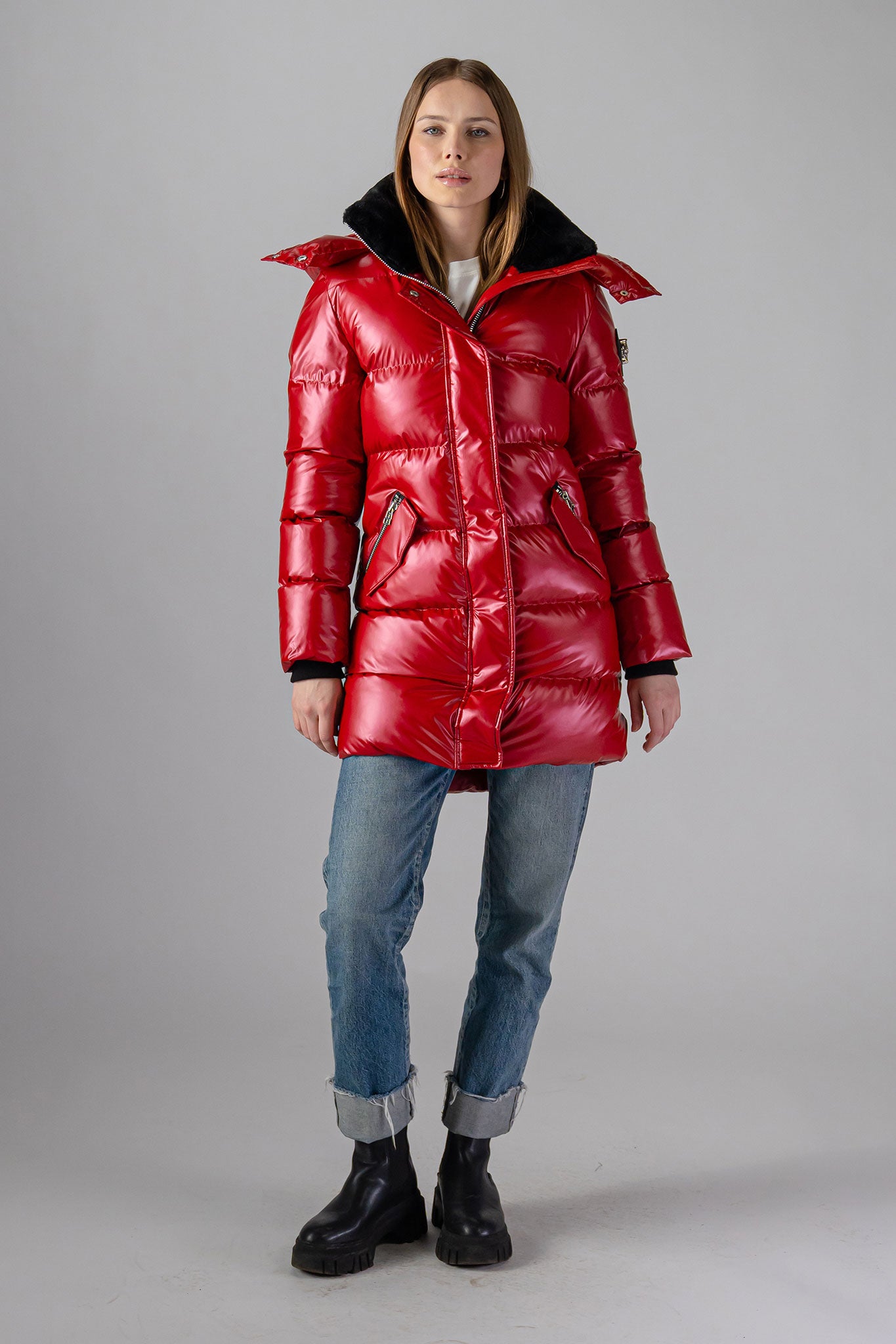 Woodpecker Women's Penguin Long Winter coat. High-end Canadian designer winter coat for women in "Raspberry" colour. Woodpecker cruelty-free winter coat designed in Canada. Women's heavy weight long length premium designer jacket for winter. Superior quality warm winter coat for women. Moose Knuckles, Canada Goose, Mackage, Montcler, Will Poho, Willbird, Nic Bayley. Extra warm. Shiny parka. Stylish winter jacket. Designer winter coat.