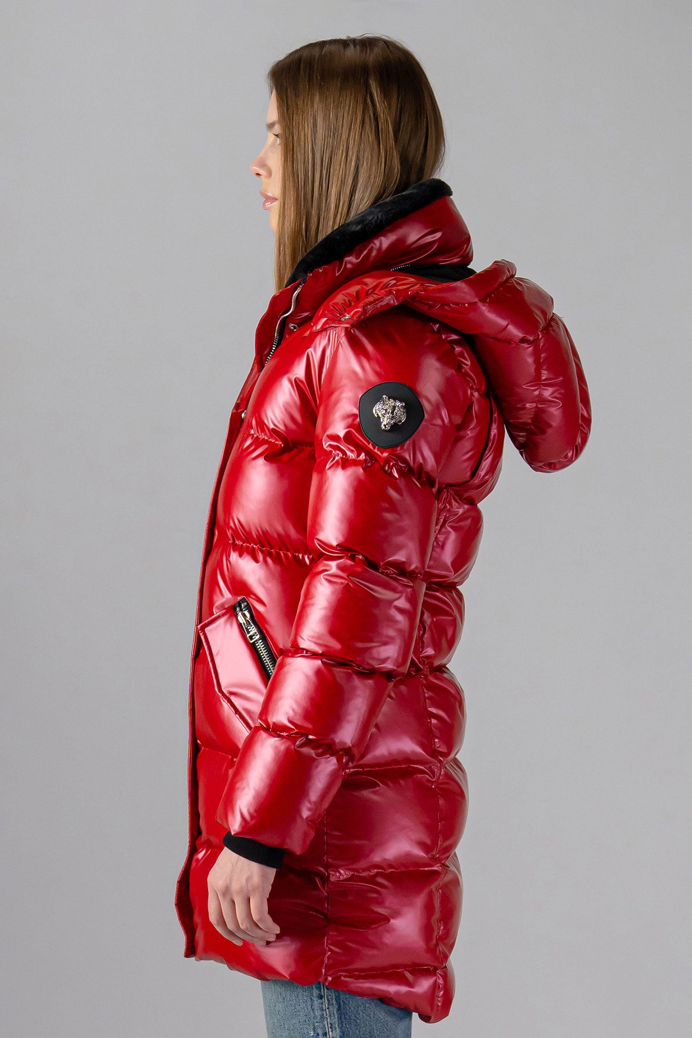 Woodpecker Women's Penguin Long Winter coat. High-end Canadian designer winter coat for women in "Raspberry" colour. Woodpecker cruelty-free winter coat designed in Canada. Women's heavy weight long length premium designer jacket for winter. Superior quality warm winter coat for women. Moose Knuckles, Canada Goose, Mackage, Montcler, Will Poho, Willbird, Nic Bayley. Extra warm. Shiny parka. Stylish winter jacket. Designer winter coat.