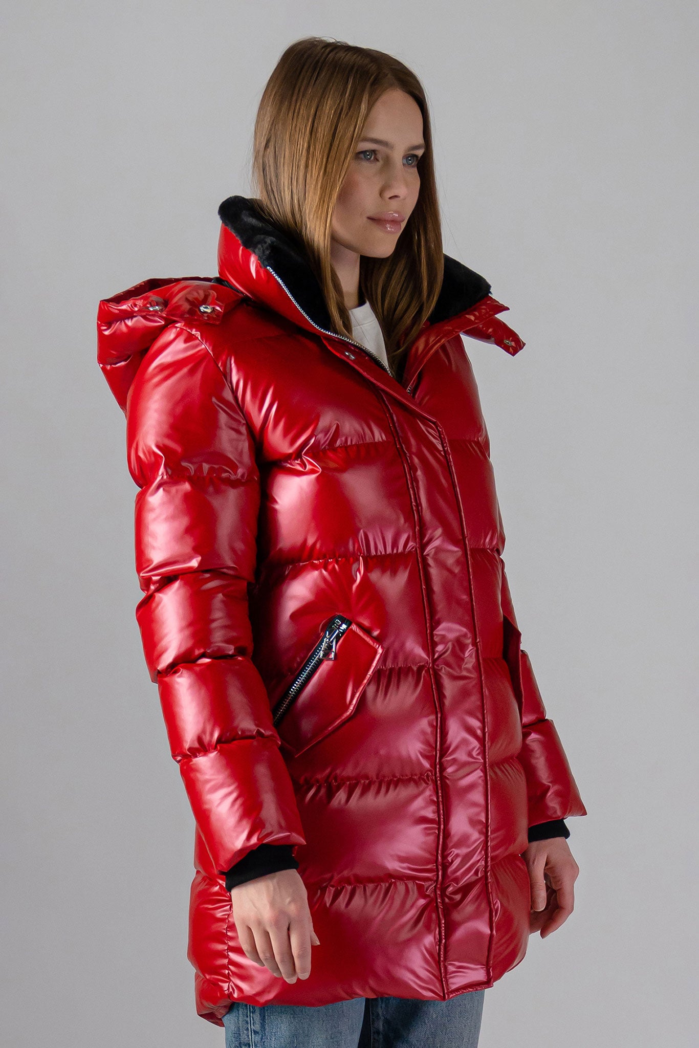 Woodpecker Women's Penguin Long Winter coat. High-end Canadian designer winter coat for women in "Raspberry" colour. Woodpecker cruelty-free winter coat designed in Canada. Women's heavy weight long length premium designer jacket for winter. Superior quality warm winter coat for women. Moose Knuckles, Canada Goose, Mackage, Montcler, Will Poho, Willbird, Nic Bayley. Extra warm. Shiny parka. Stylish winter jacket. Designer winter coat.