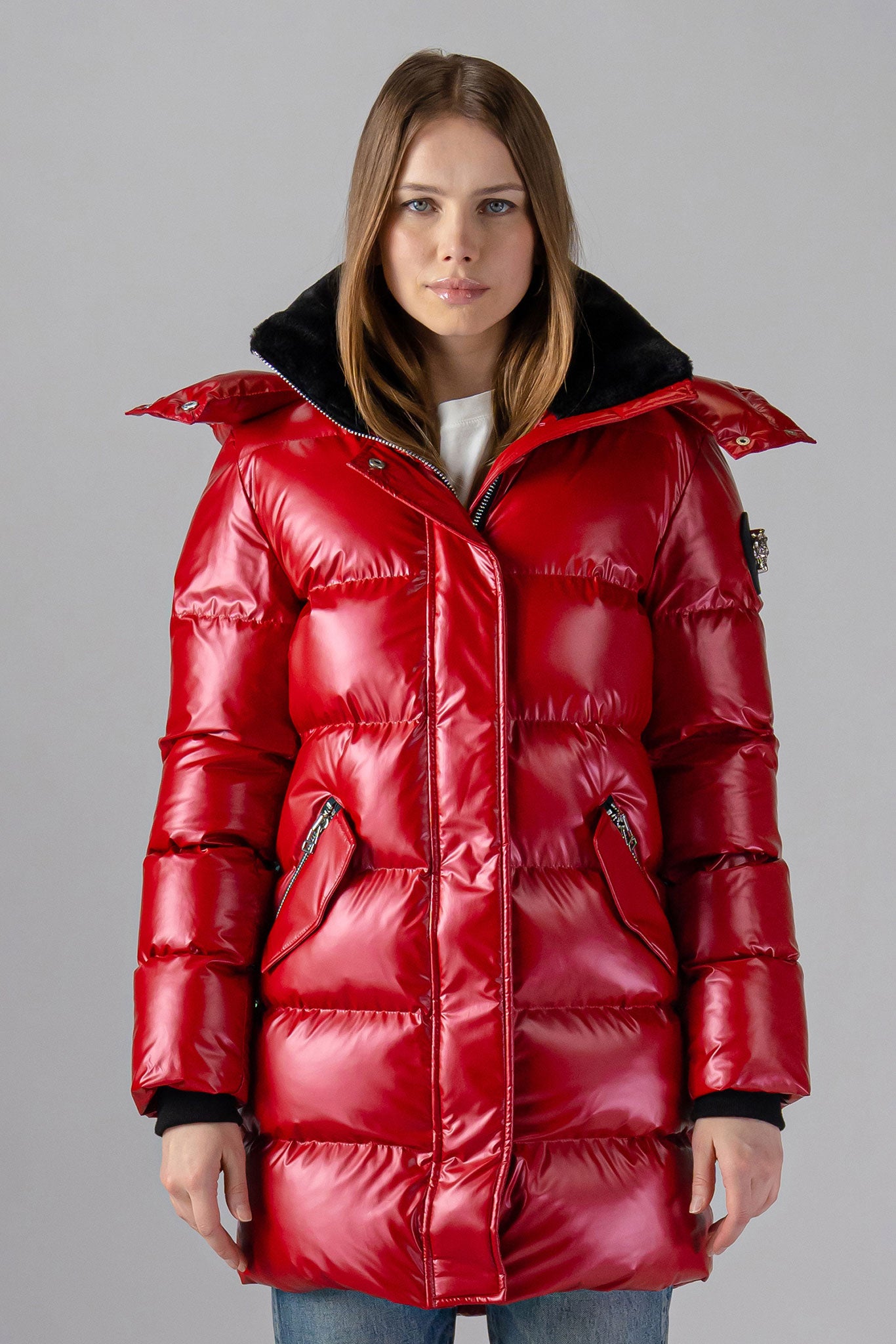Woodpecker Women's Penguin Long Winter coat. High-end Canadian designer winter coat for women in "Raspberry" colour. Woodpecker cruelty-free winter coat designed in Canada. Women's heavy weight long length premium designer jacket for winter. Superior quality warm winter coat for women. Moose Knuckles, Canada Goose, Mackage, Montcler, Will Poho, Willbird, Nic Bayley. Extra warm. Shiny parka. Stylish winter jacket. Designer winter coat.