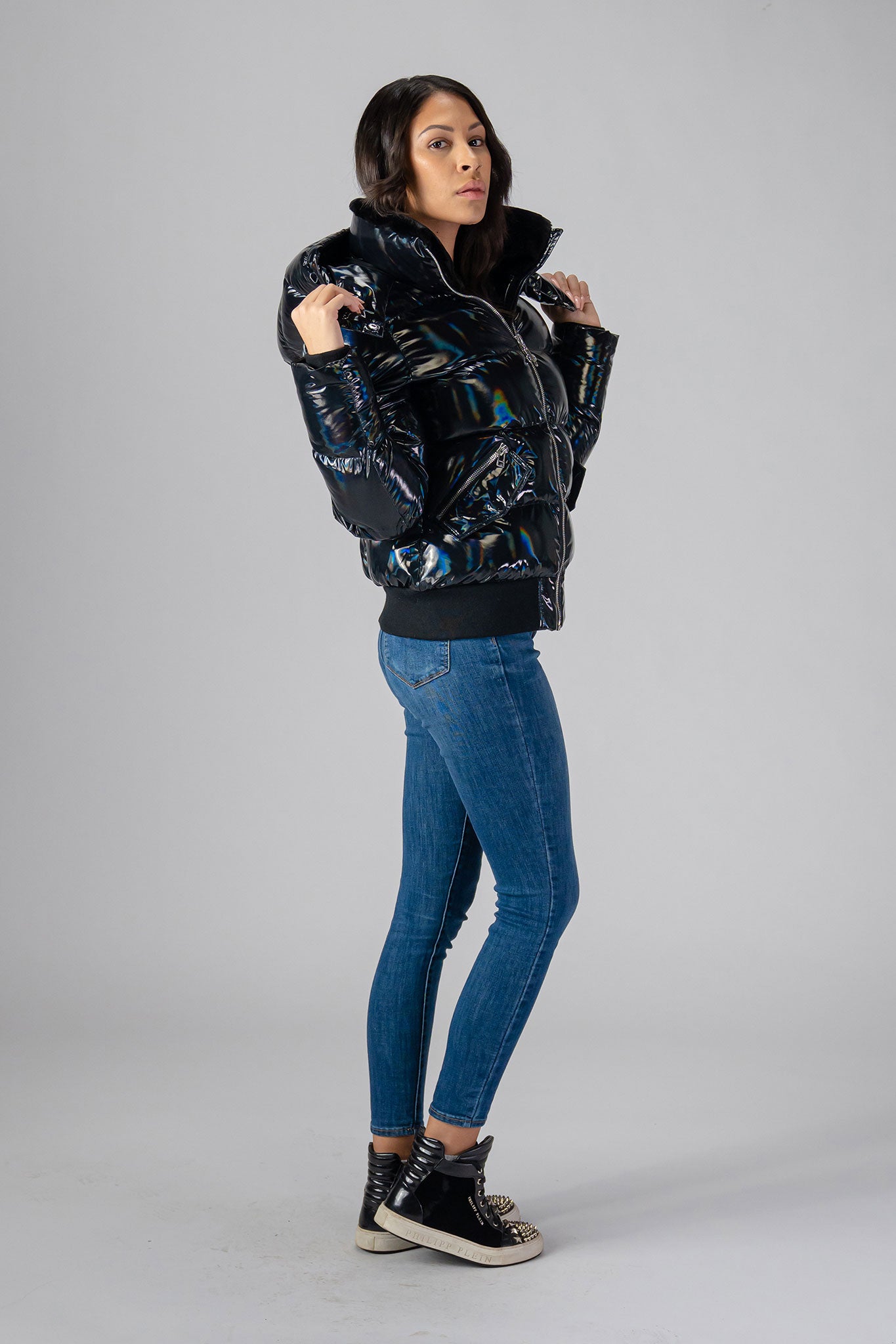 Woodpecker Women's Woody Bomber Winter coat. High-end Canadian designer winter coat for women in "Oily Black" colour. Woodpecker cruelty-free winter coat designed in Canada. Women's heavy weight short length premium designer jacket for winter. Superior quality warm winter coat for women. Moose Knuckles, Canada Goose, Mackage, Montcler, Will Poho, Willbird, Nic Bayley. Shiny parka. Stylish winter jacket. Designer winter coat.