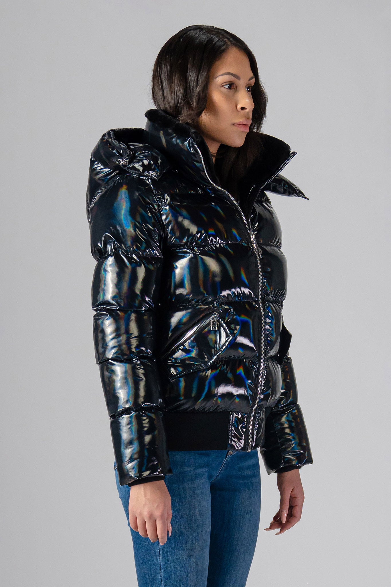 Woodpecker Women's Woody Bomber Winter coat. High-end Canadian designer winter coat for women in "Oily Black" colour. Woodpecker cruelty-free winter coat designed in Canada. Women's heavy weight short length premium designer jacket for winter. Superior quality warm winter coat for women. Moose Knuckles, Canada Goose, Mackage, Montcler, Will Poho, Willbird, Nic Bayley. Shiny parka. Stylish winter jacket. Designer winter coat.