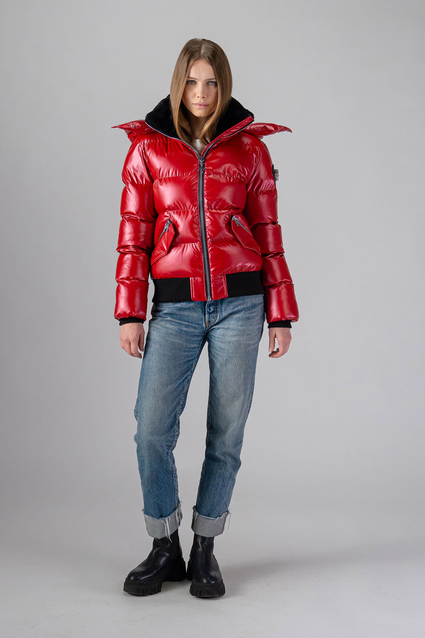 Woodpecker Women's Woody Bomber Winter coat. High-end Canadian designer winter coat for women in "Raspberry" colour. Woodpecker cruelty-free winter coat designed in Canada. Women's heavy weight short length premium designer jacket for winter. Superior quality warm winter coat for women. Moose Knuckles, Canada Goose, Mackage, Montcler, Will Poho, Willbird, Nic Bayley. Shiny parka. Stylish winter jacket. Designer winter coat.