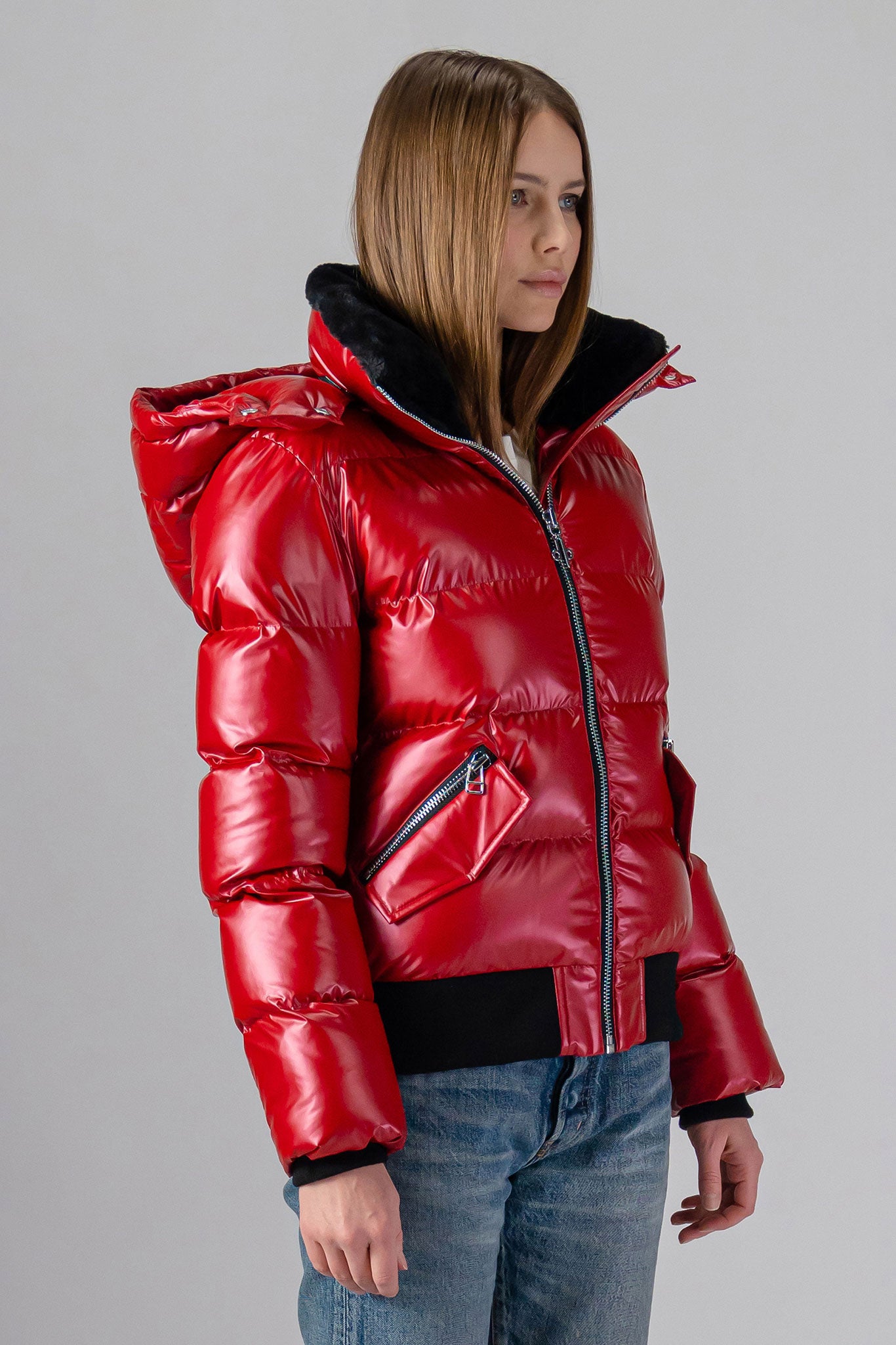 Woodpecker Women's Woody Bomber Winter coat. High-end Canadian designer winter coat for women in "Raspberry" colour. Woodpecker cruelty-free winter coat designed in Canada. Women's heavy weight short length premium designer jacket for winter. Superior quality warm winter coat for women. Moose Knuckles, Canada Goose, Mackage, Montcler, Will Poho, Willbird, Nic Bayley. Shiny parka. Stylish winter jacket. Designer winter coat.