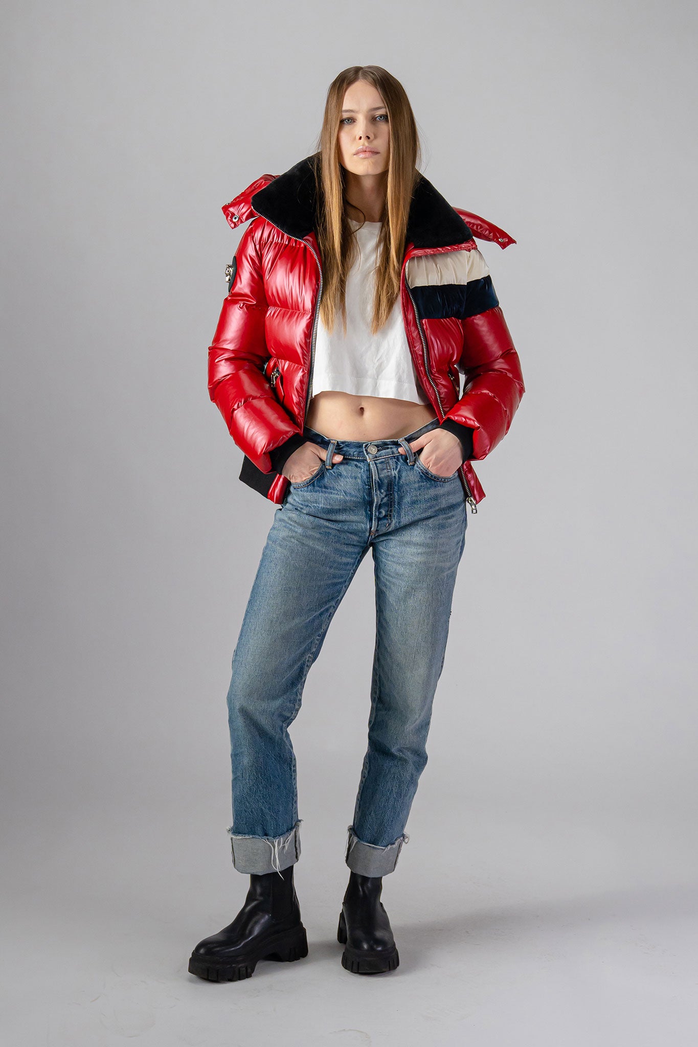 Woodpecker Women's Woody Bomber Winter coat. High-end Canadian designer winter coat for women in "Red White Blue" colour. Woodpecker cruelty-free winter coat designed in Canada. Women's heavy weight short length premium designer jacket for winter. Superior quality warm winter coat for women. Moose Knuckles, Canada Goose, Mackage, Montcler, Will Poho, Willbird, Nic Bayley. Shiny parka. Stylish winter jacket. Designer winter coat.