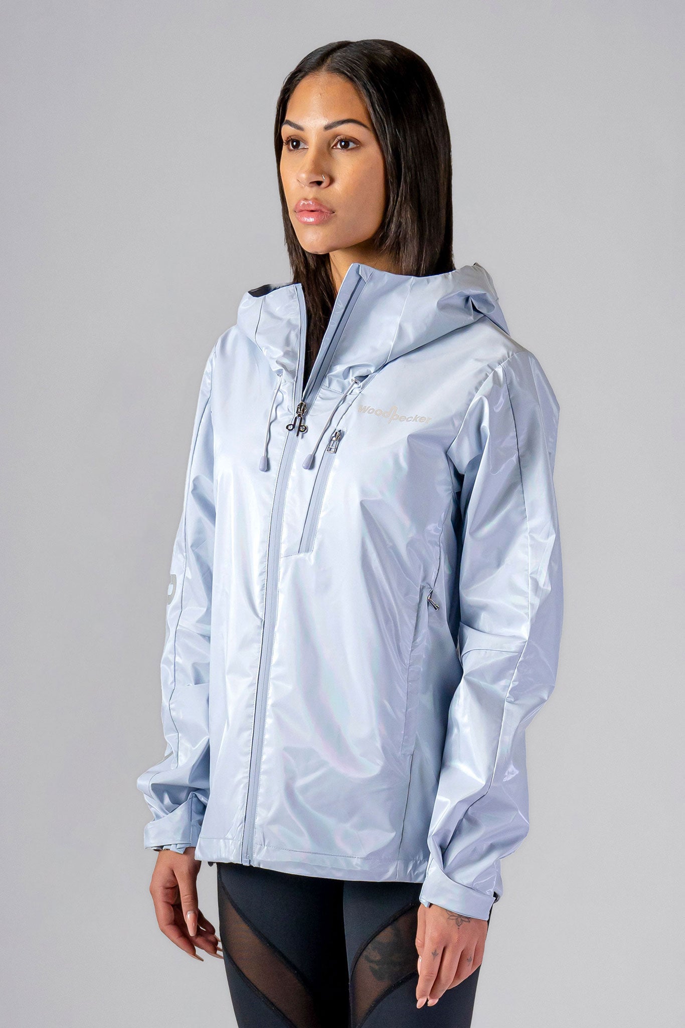 Woodpecker Women's Wind Shell coat. High-end Canadian designer activewear coat for women in "Crème de Menthe" colour. Woodpecker coat designed in Canada. Moose Knuckles, Canada Goose, Mackage, Montcler, Will Poho, Willbird, Nic Bayley.