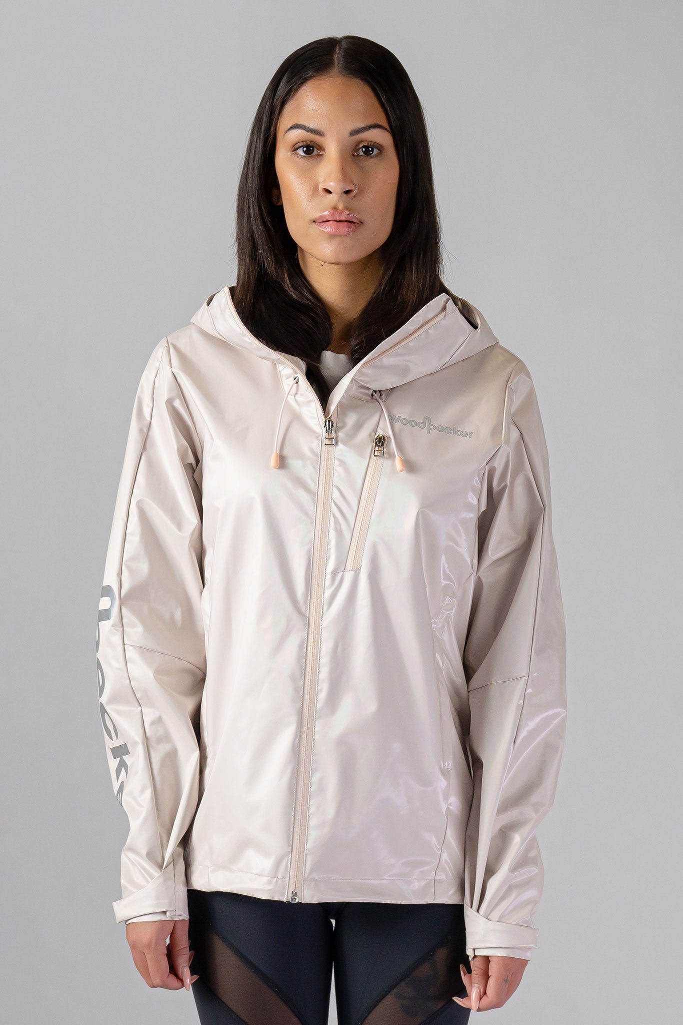 Woodpecker Women's Wind Shell coat. High-end Canadian designer activewear coat for women in "Flamingo" colour. Woodpecker coat designed in Canada. Moose Knuckles, Canada Goose, Mackage, Montcler, Will Poho, Willbird, Nic Bayley.