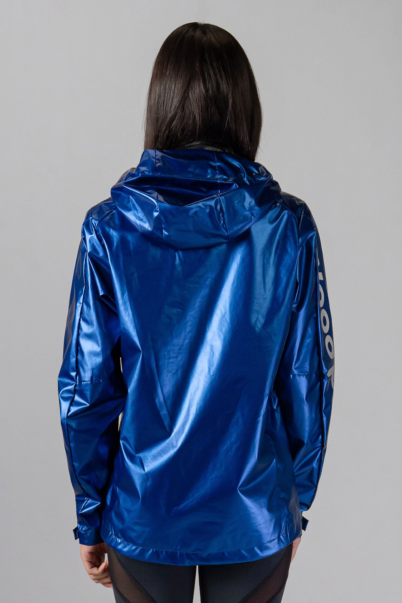 Woodpecker Women's Wind Shell coat. High-end Canadian designer activewear coat for women in "Flash Blue" colour. Woodpecker coat designed in Canada. Moose Knuckles, Canada Goose, Mackage, Montcler, Will Poho, Willbird, Nic Bayley.