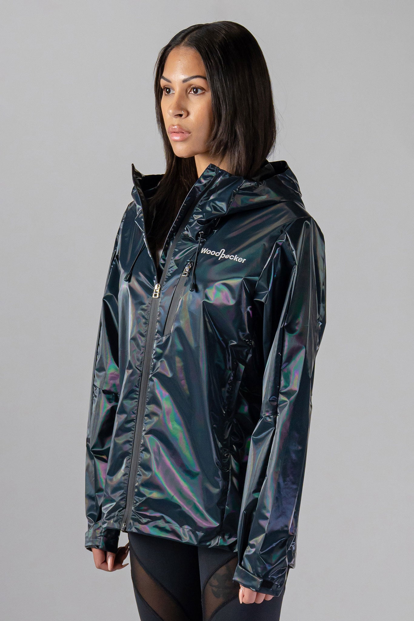 Woodpecker Women's Wind Shell coat. High-end Canadian designer activewear coat for women in "Raven Black" colour. Woodpecker coat designed in Canada. Moose Knuckles, Canada Goose, Mackage, Montcler, Will Poho, Willbird, Nic Bayley.