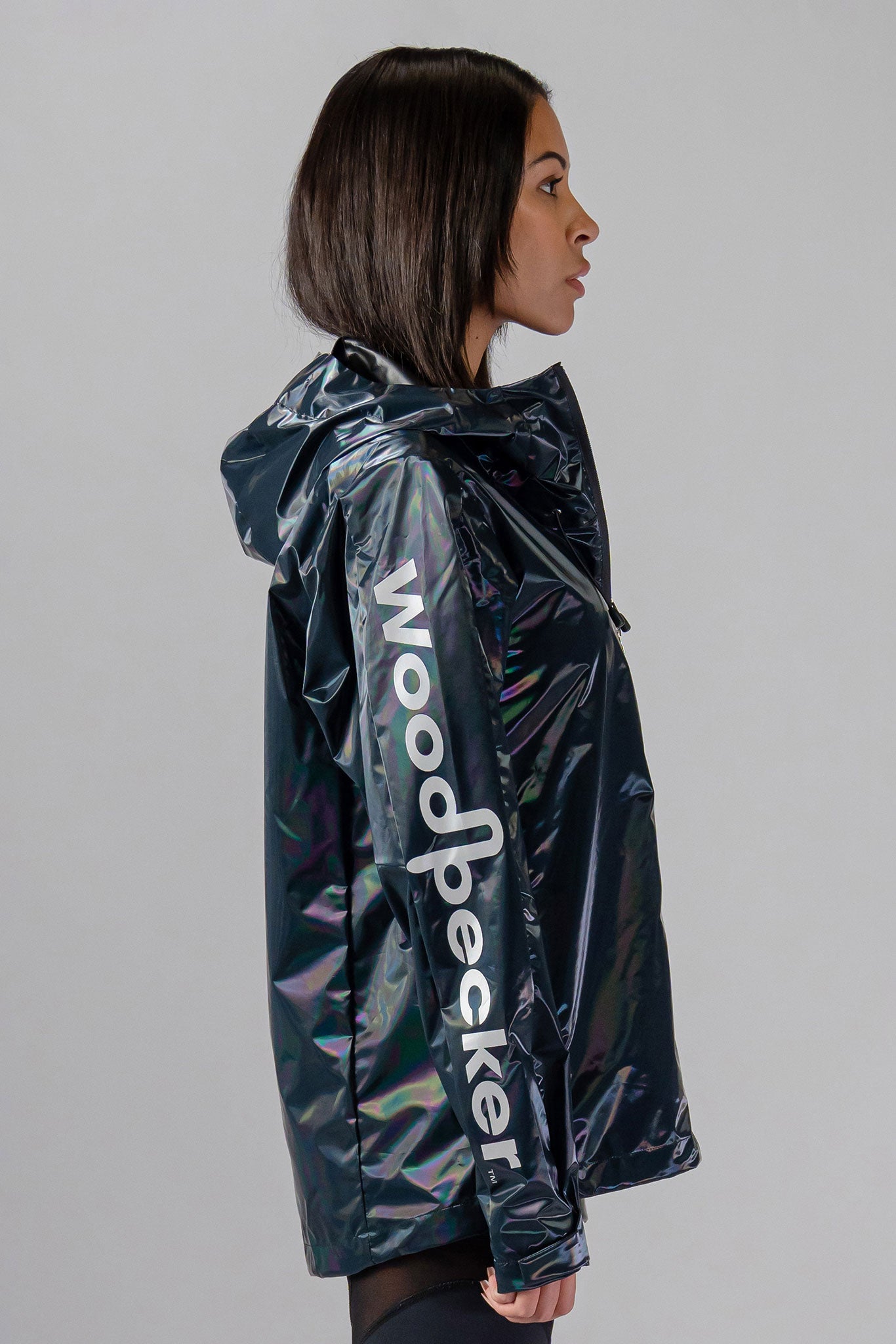 Woodpecker Women's Wind Shell coat. High-end Canadian designer activewear coat for women in "Raven Black" colour. Woodpecker coat designed in Canada. Moose Knuckles, Canada Goose, Mackage, Montcler, Will Poho, Willbird, Nic Bayley.