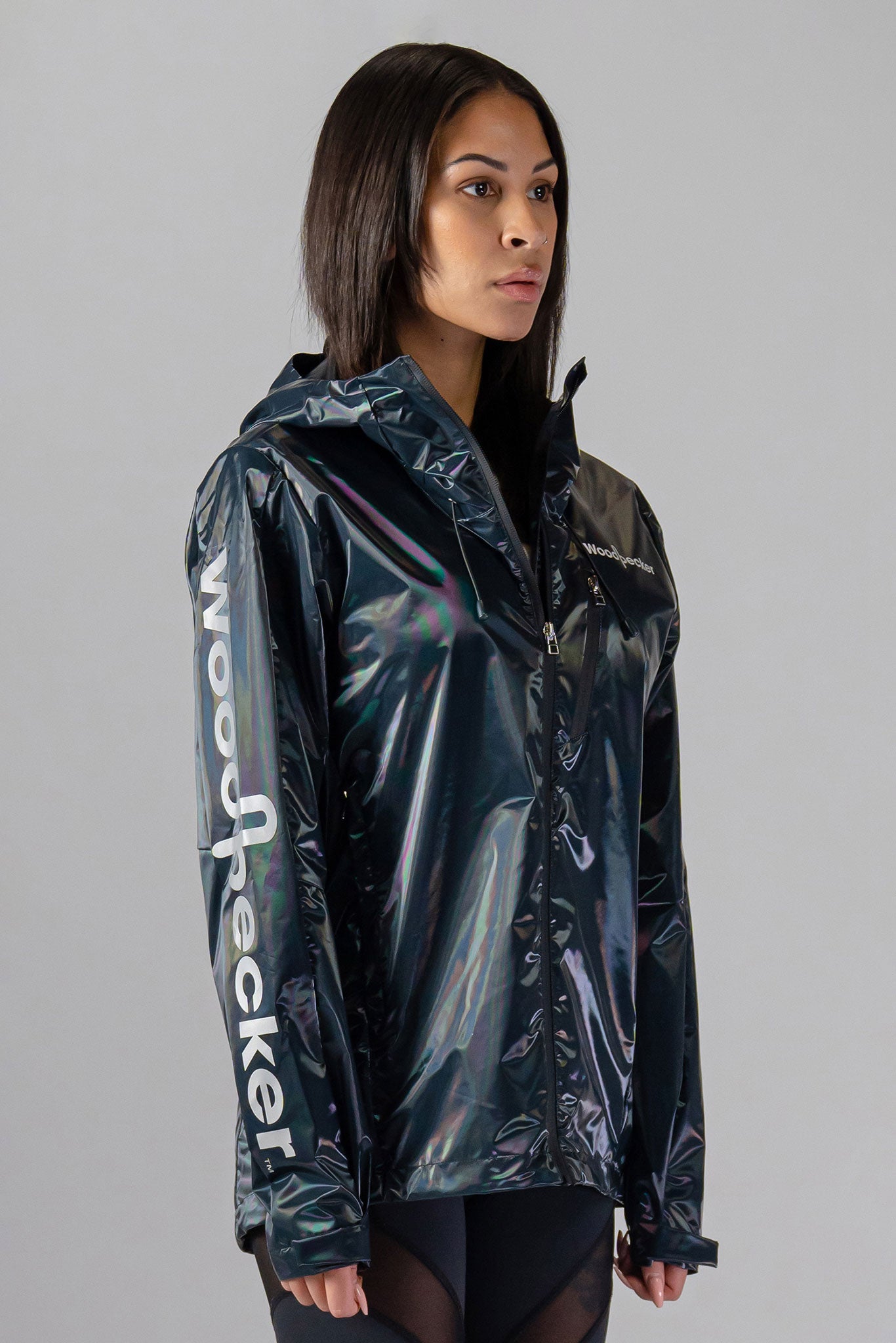 Woodpecker Women's Wind Shell coat. High-end Canadian designer activewear coat for women in "Raven Black" colour. Woodpecker coat designed in Canada. Moose Knuckles, Canada Goose, Mackage, Montcler, Will Poho, Willbird, Nic Bayley.