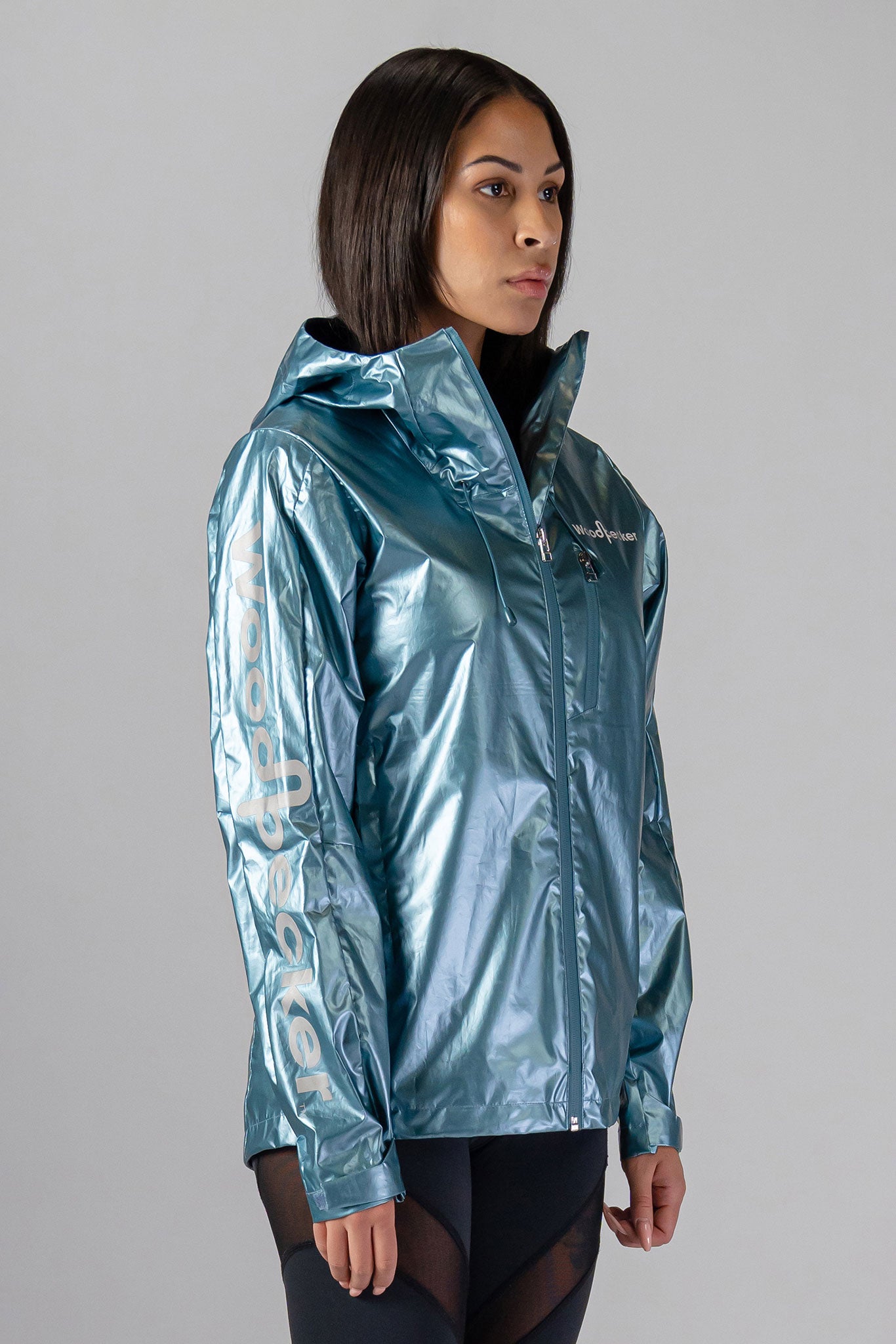 Woodpecker Women's Wind Shell coat. High-end Canadian designer activewear coat for women in "Spearmint" colour. Woodpecker coat designed in Canada. Moose Knuckles, Canada Goose, Mackage, Montcler, Will Poho, Willbird, Nic Bayley.