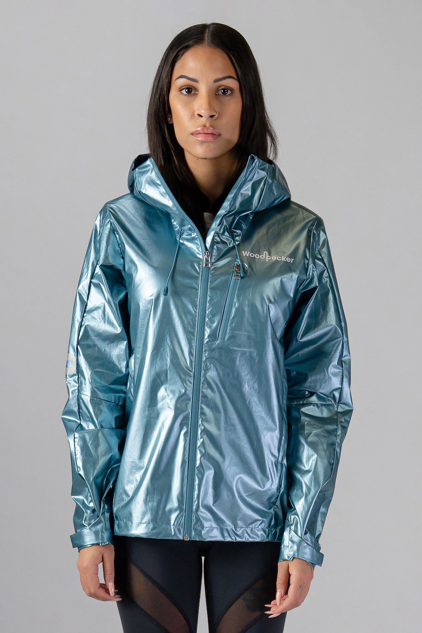 Woodpecker Women's Wind Shell coat. High-end Canadian designer activewear coat for women in "Spearmint" colour. Woodpecker coat designed in Canada. Moose Knuckles, Canada Goose, Mackage, Montcler, Will Poho, Willbird, Nic Bayley.