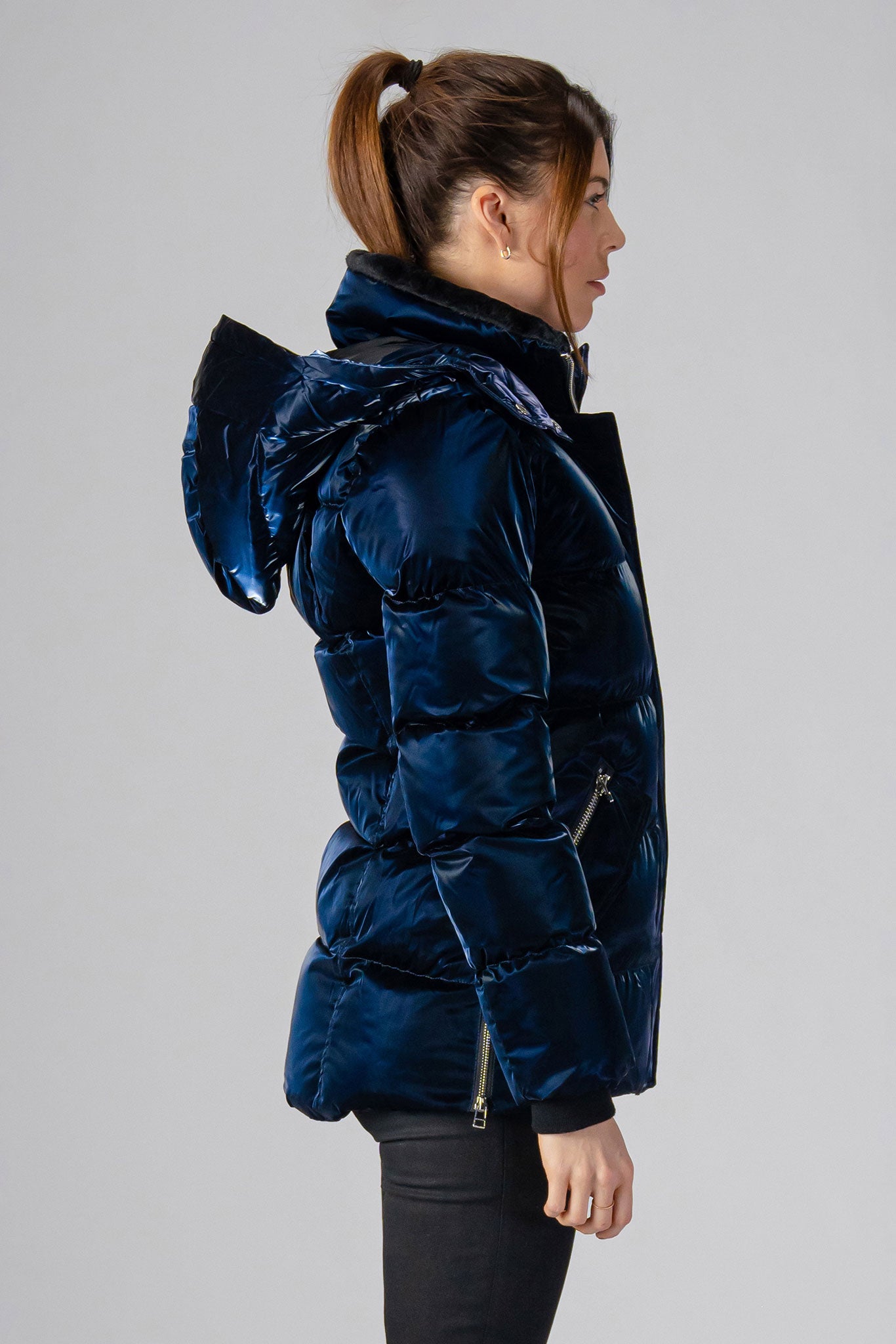 Woodpecker Women's Bumnester Winter coat. High-end Canadian designer winter coat for women in shiny "All Wet Navy" colour. Woodpecker cruelty-free winter coat designed in Canada. Women's heavy weight medium length premium designer jacket for winter. Superior quality warm winter coat for women. Moose Knuckles, Canada Goose, Mackage, Montcler, Will Poho, Willbird, Nic Bayley. Extra warm. Shiny parka. Stylish winter jacket. Designer winter coat.