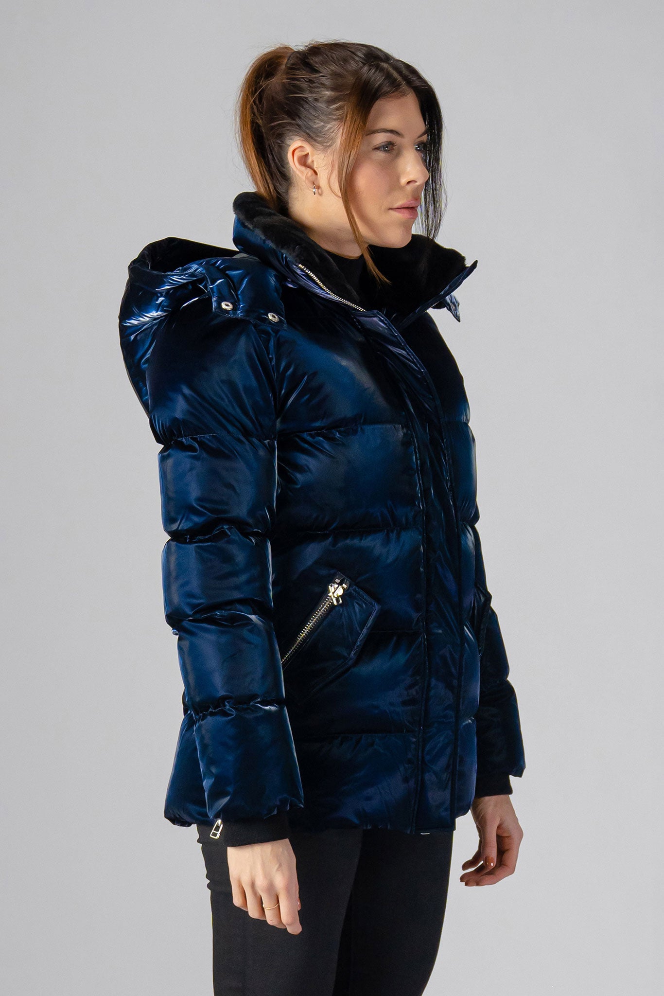 Woodpecker Women's Bumnester Winter coat. High-end Canadian designer winter coat for women in shiny "All Wet Navy" colour. Woodpecker cruelty-free winter coat designed in Canada. Women's heavy weight medium length premium designer jacket for winter. Superior quality warm winter coat for women. Moose Knuckles, Canada Goose, Mackage, Montcler, Will Poho, Willbird, Nic Bayley. Extra warm. Shiny parka. Stylish winter jacket. Designer winter coat.