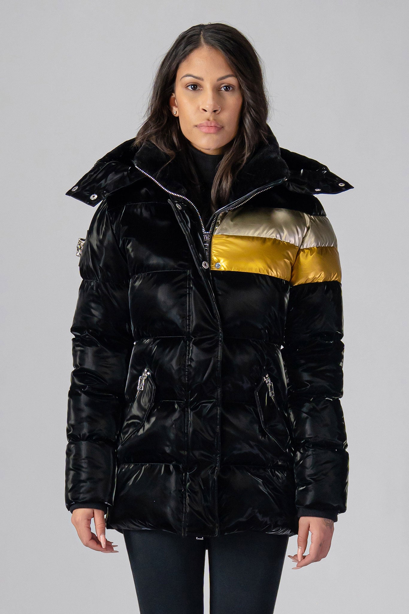 Woodpecker Women's Bumnester Winter coat. High-end Canadian designer winter coat for women in shiny "Firebird" colour. Woodpecker cruelty-free winter coat designed in Canada. Women's heavy weight medium length premium designer jacket for winter. Superior quality warm winter coat for women. Moose Knuckles, Canada Goose, Mackage, Montcler, Will Poho, Willbird, Nic Bayley. Extra warm. Shiny parka. Stylish winter jacket. Designer winter coat.