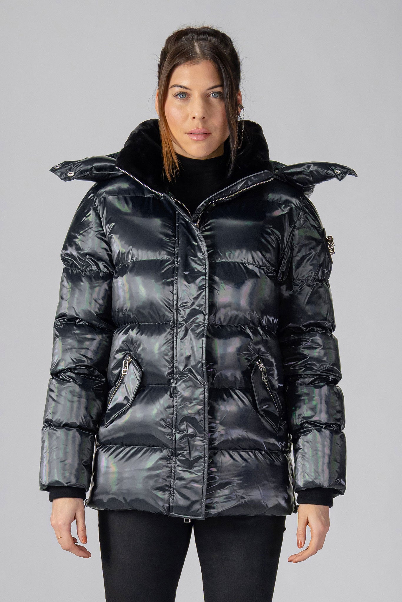 Woodpecker Women's Bumnester Winter coat. High-end Canadian designer winter coat for women in "Oily Black" colour. Woodpecker cruelty-free winter coat designed in Canada. Women's heavy weight medium length premium designer jacket for winter. Superior quality warm winter coat for women. Moose Knuckles, Canada Goose, Mackage, Montcler, Will Poho, Willbird, Nic Bayley. Extra warm. Shiny parka. Stylish winter jacket. Designer winter coat.