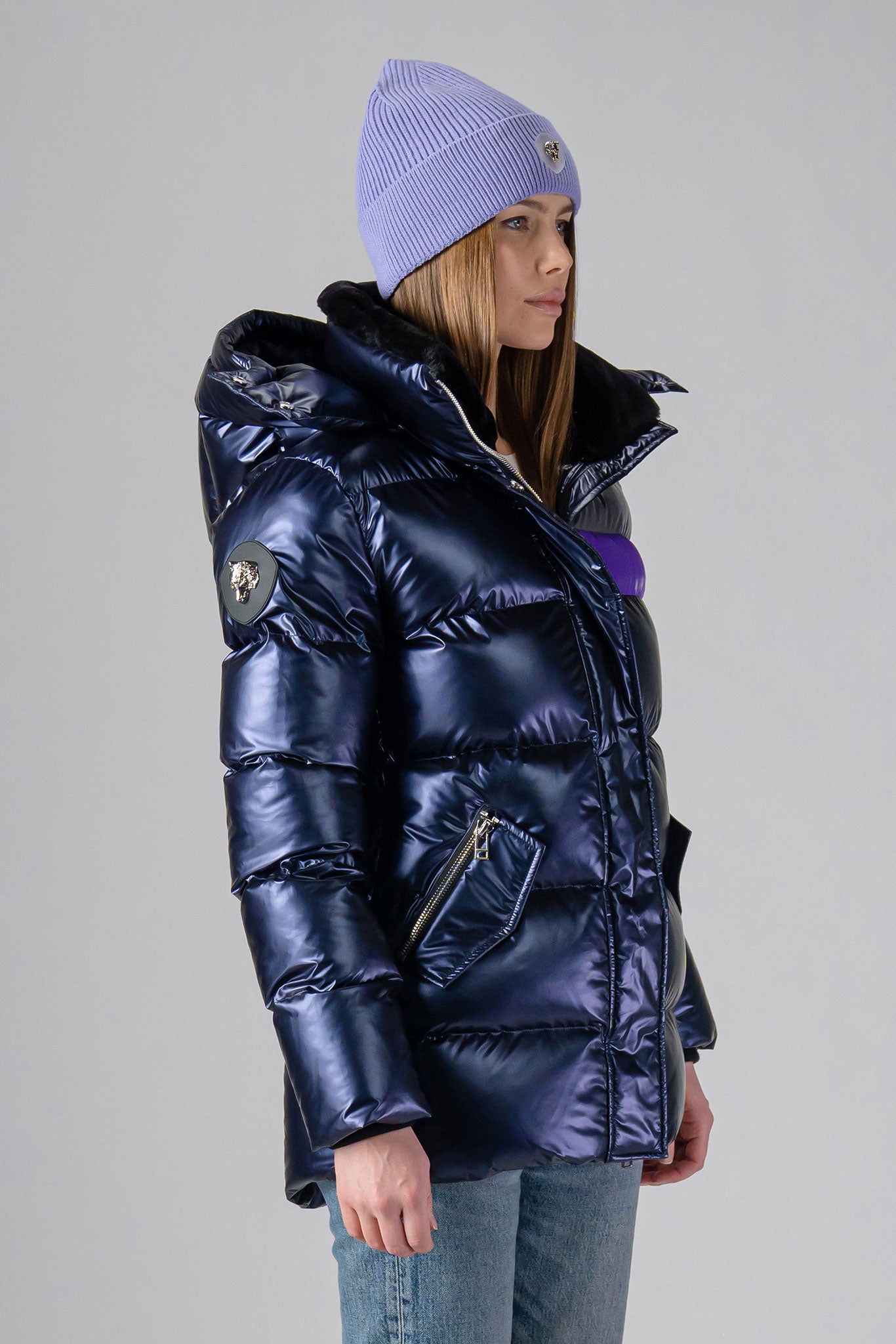 Woodpecker Women's Bumnester Winter coat. High-end Canadian designer winter coat for women in shiny "Sapphire/Silver/Purple" colour. Woodpecker cruelty-free winter coat designed in Canada. Women's heavy weight medium length premium designer jacket for winter. Superior quality warm winter coat for women. Moose Knuckles, Canada Goose, Mackage, Montcler, Will Poho, Willbird, Nic Bayley. Extra warm. Shiny parka. Stylish winter jacket. Designer winter coat.