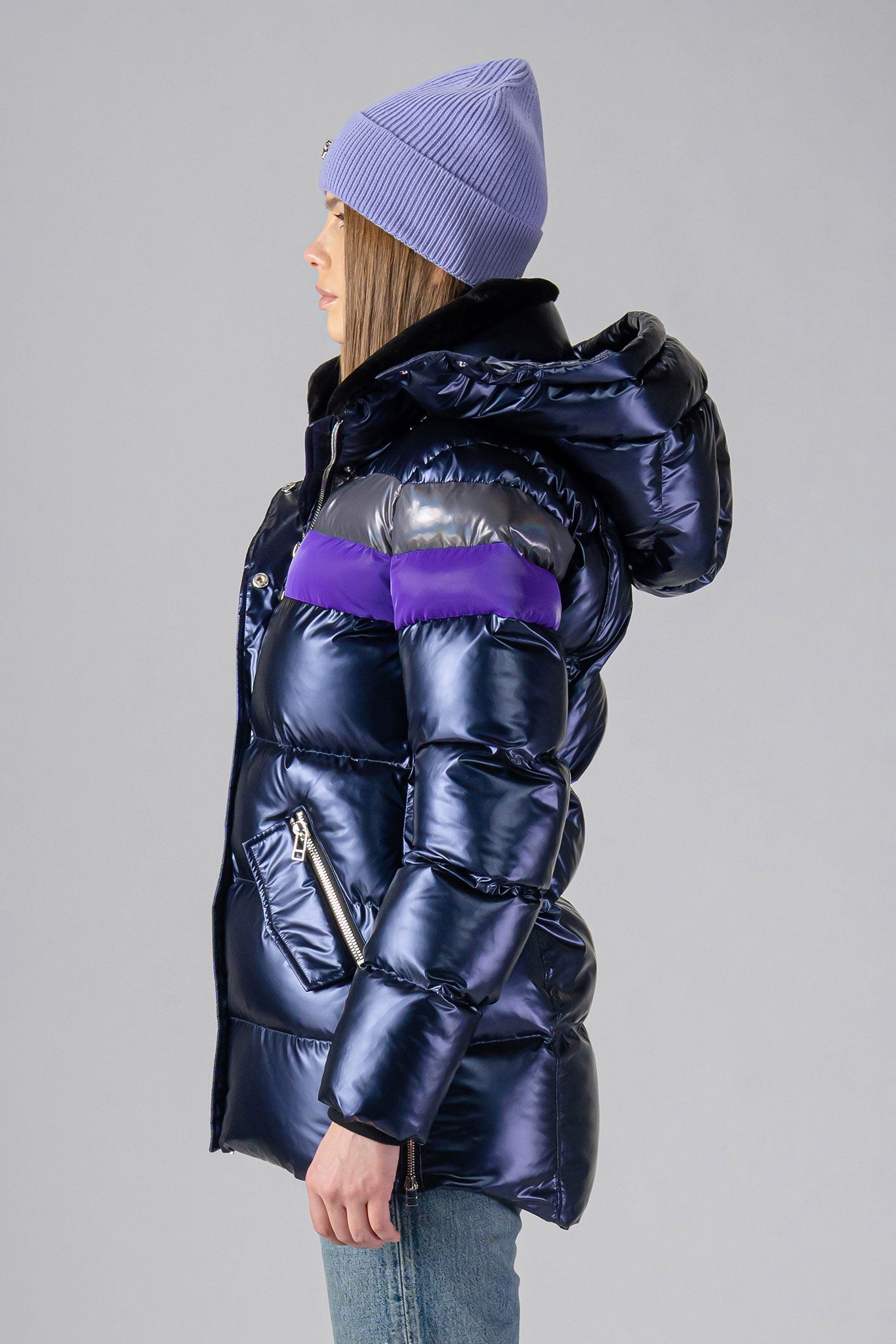 Woodpecker Women's Bumnester Winter coat. High-end Canadian designer winter coat for women in shiny "Sapphire/Silver/Purple" colour. Woodpecker cruelty-free winter coat designed in Canada. Women's heavy weight medium length premium designer jacket for winter. Superior quality warm winter coat for women. Moose Knuckles, Canada Goose, Mackage, Montcler, Will Poho, Willbird, Nic Bayley. Extra warm. Shiny parka. Stylish winter jacket. Designer winter coat.
